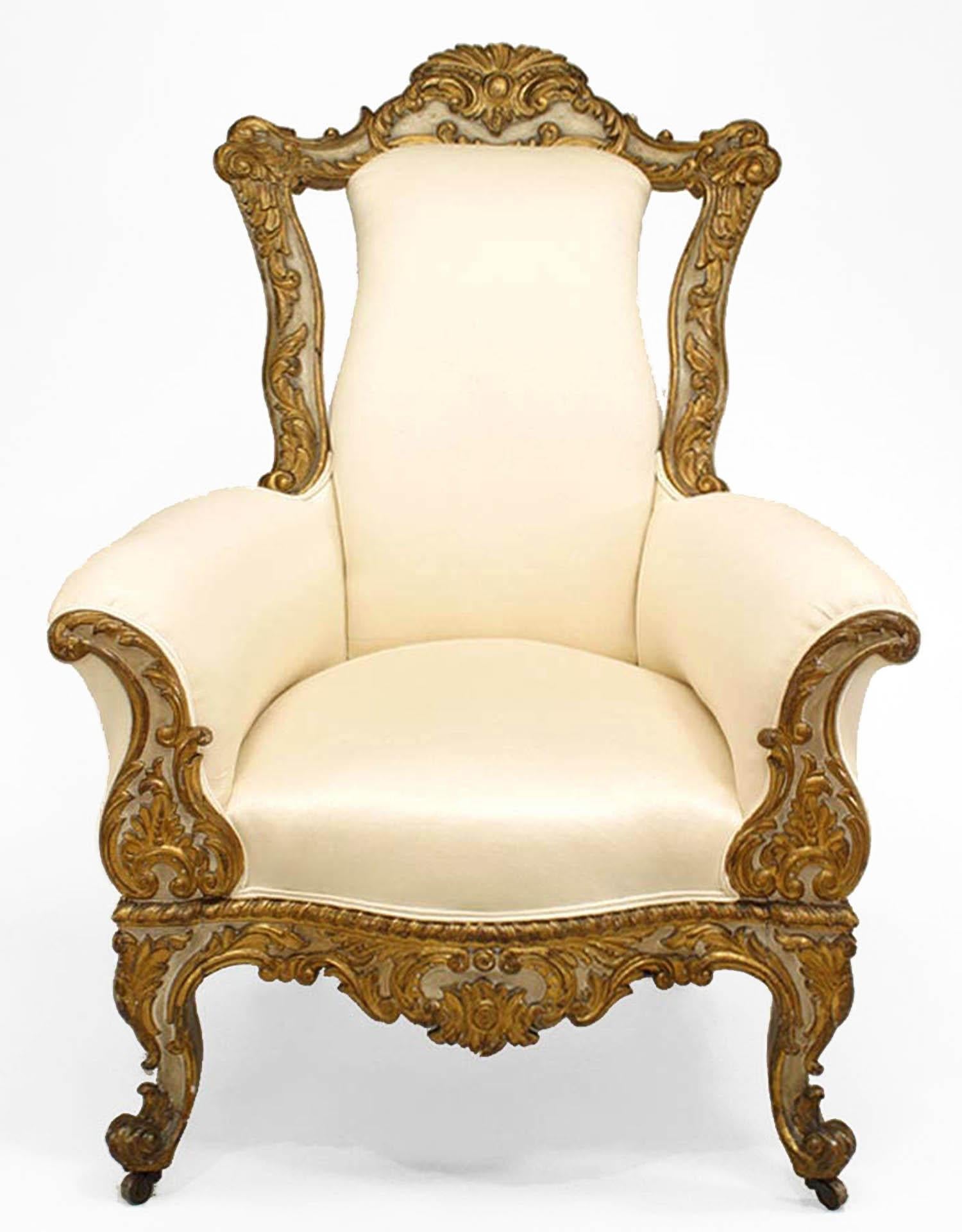 Italian Venetian-style (19th Century) white and gold painted and carved high back berg√®re with white upholstery.
