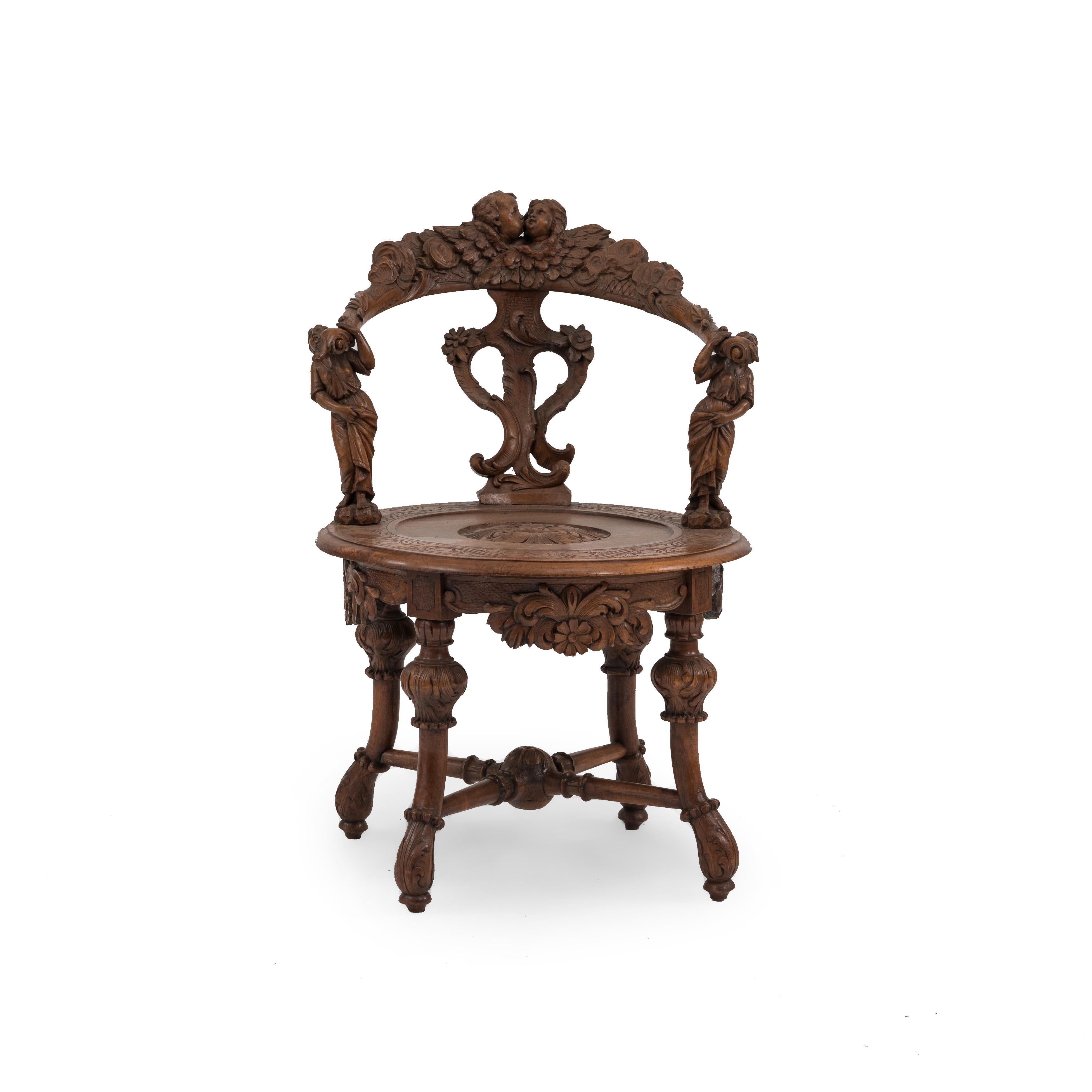 Italian Venetian-style (19th Century) stripped and carved round back armchair with carved figures supporting the arms.
