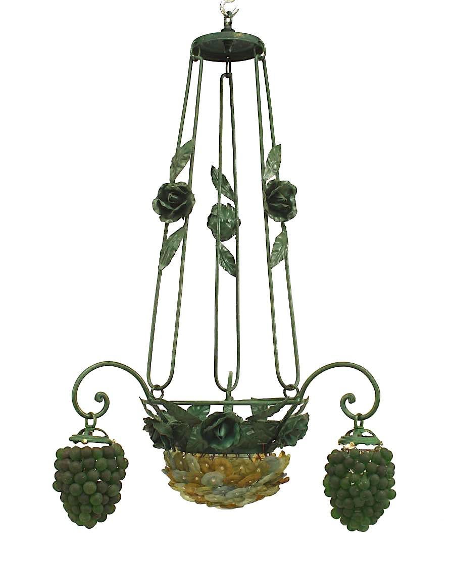 Italian Venetian 3 arm chandelier with green painted metal flowers and leaf design with a bowl base of glass flowers and 3 Murano green glass grape design shades.
