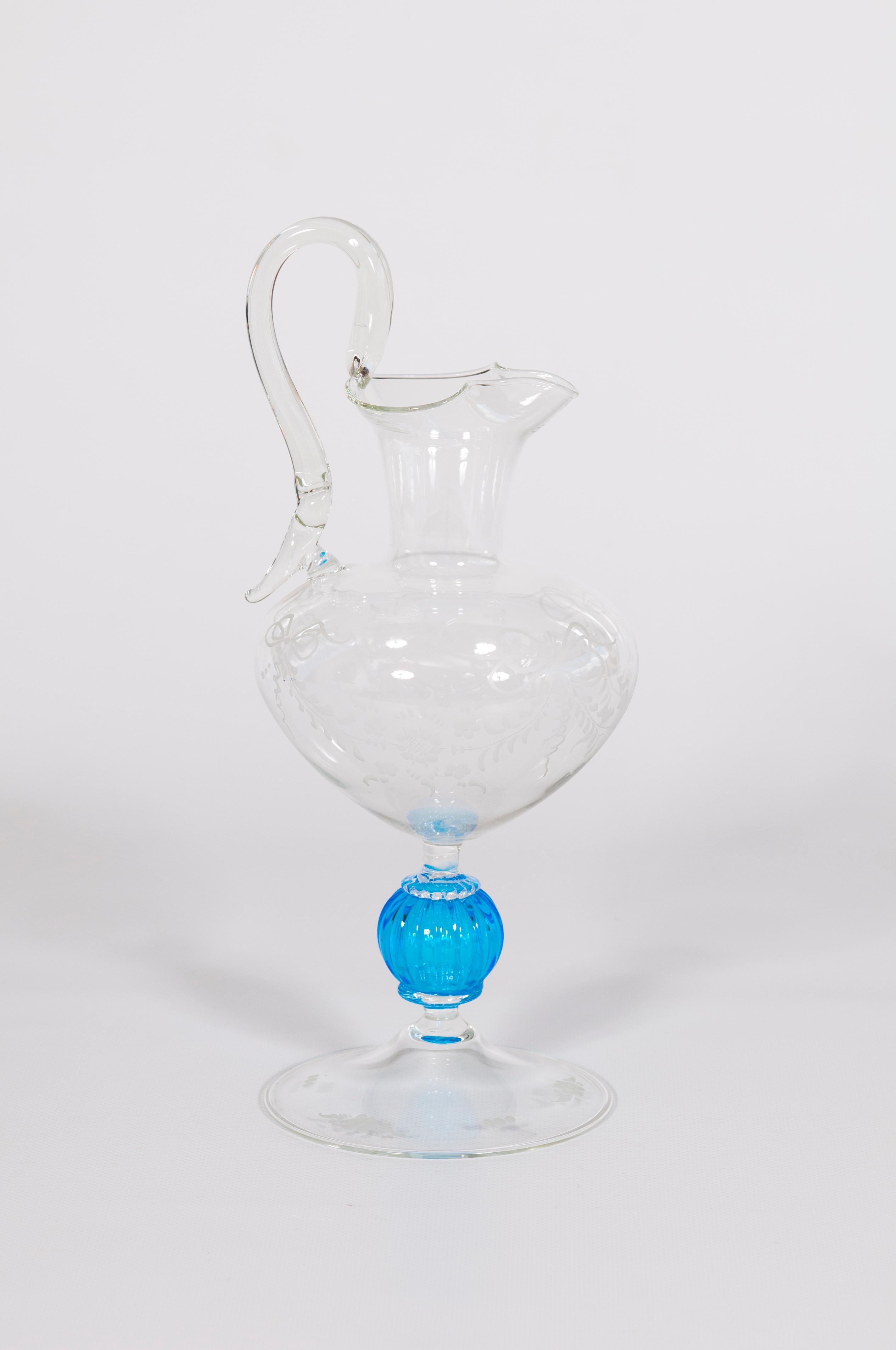 Italian Venetian Transparent and Blue Murano Glass Carafe Contemporary 1990s. 
This amazing and unique Venetian work of art was made in the island of Murano in the 1990s. It was entirely handcrafted by local glass artists following the ancient
