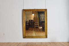Italian, Veneto, Late LXIV Period Shaped Giltwood Mirror, circa 1700
