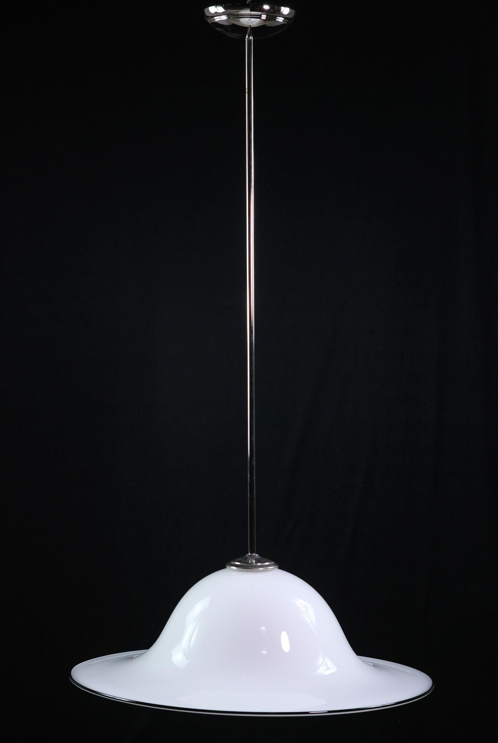 Large size Italian white Vetri Murano glass shade featuring a black rim pole mounted with a nickel finish. Hand blown glass shade. This can be seen at our 400 Gilligan St location in Scranton, PA.