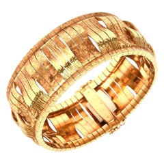 Brazalete escultórico italiano vintage de oro de 18 quilates