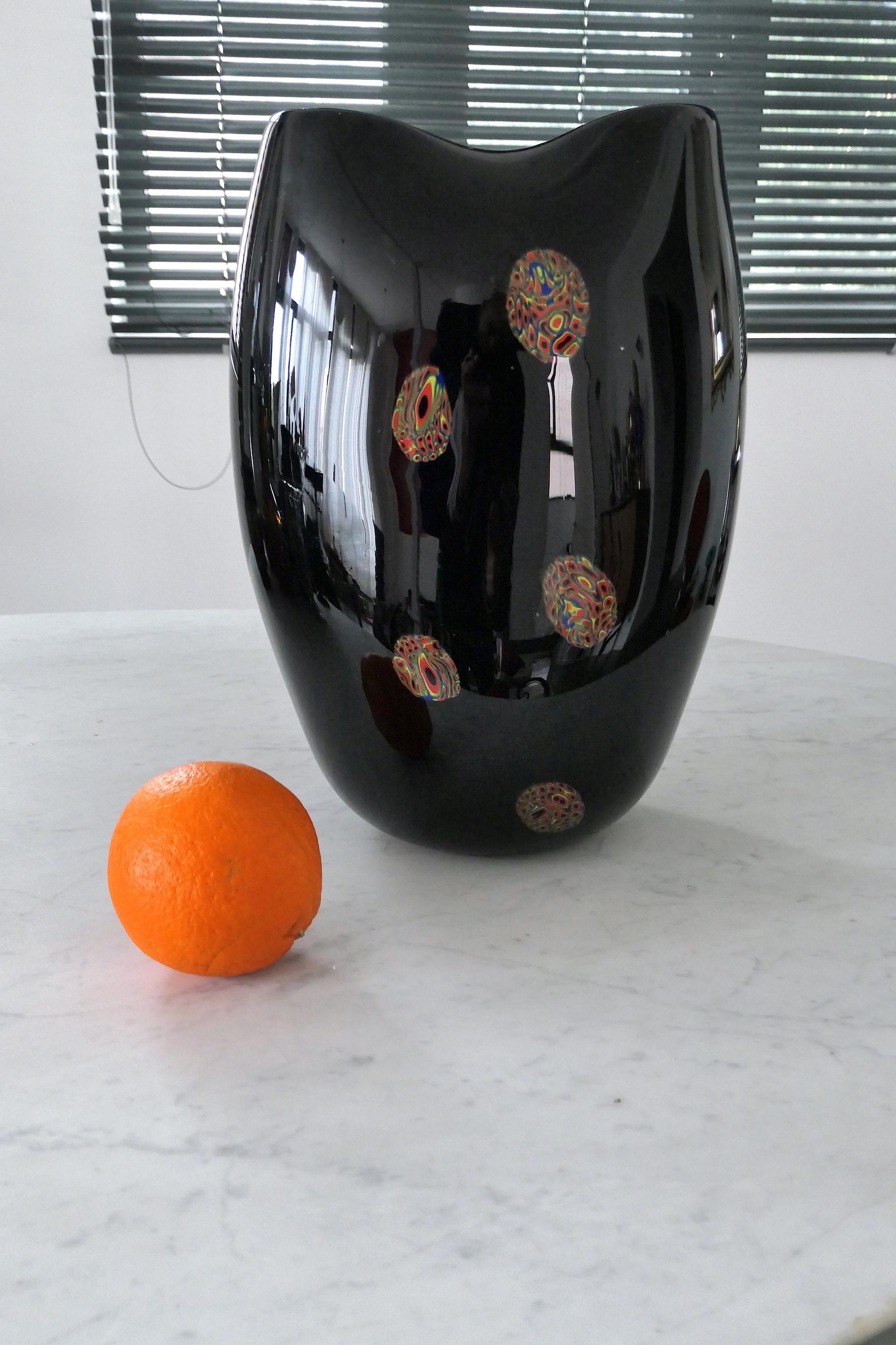 A grand Italian 20th century vintage Venetian Murano decorative vase crafted in Sommerso technique with millefiori inspired specks of bright orange, yellow and blue.
Italy, circa 1970s.

-----
We are an exhibition space and an online destination