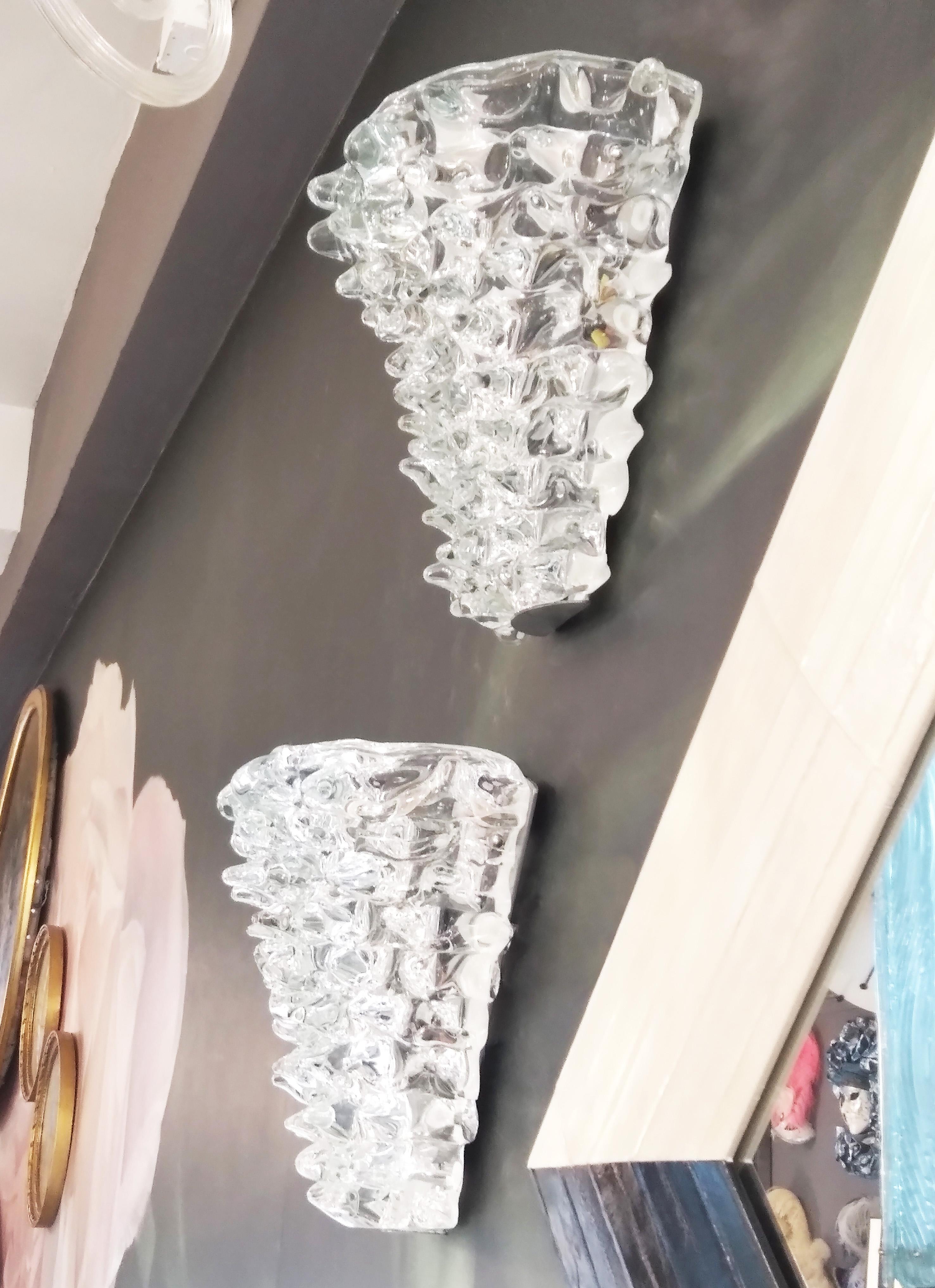 An extraordinary Venetian organic sculpture pair of crystal clear Murano glass modern wall lights by Barovier Toso, with a cone shape, realized using the Rostrato technique that Barovier Toso revived with exceptional skill and success, as