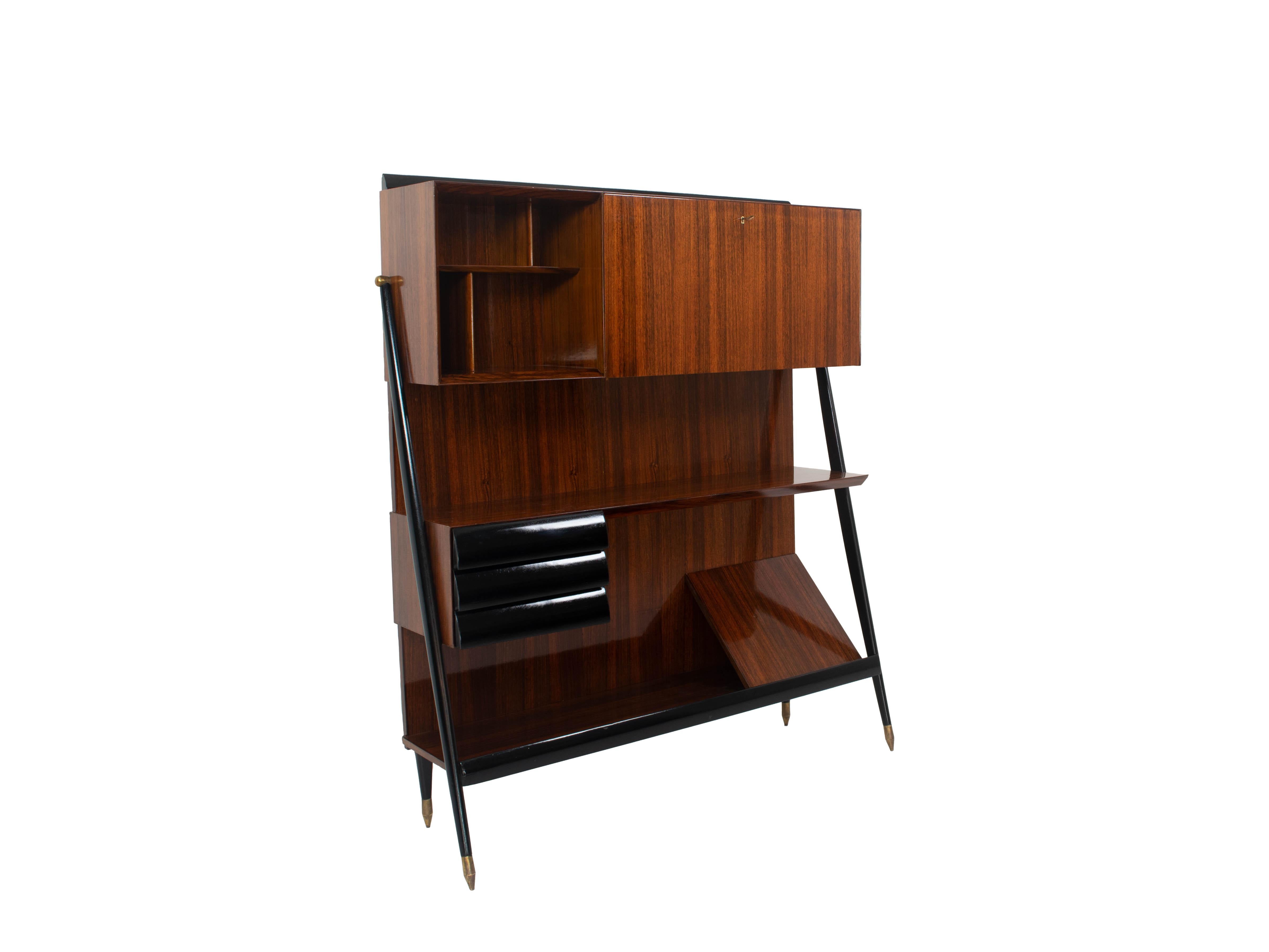 Italian vintage book cabinet or bar cabinet attributed to Ico Parisi, 1950s. This amazing piece of furniture is made of wood and ebonized wood and has two functions; it can serve as a book cabinet, but also has a bar corner to be a bar cabinet. It