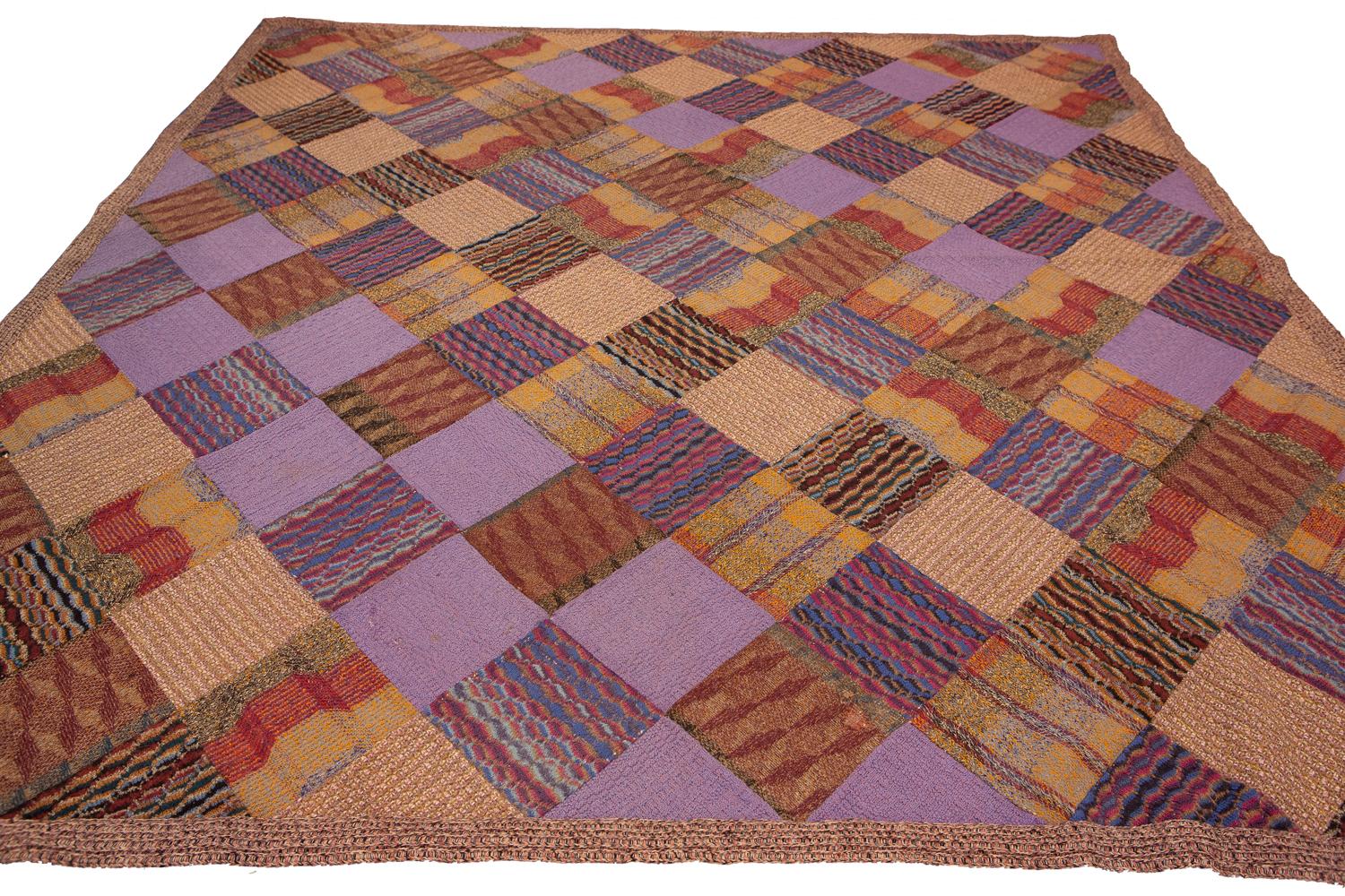 This is a one-of-a-kind Italian vintage carpet, woven circa 1920-1950. It's made of wool, and measures 242 x 226 cm in size. The beautiful design is a work of famous designer called Ottavio Missoni, and the colors are rich and amazing. This would be