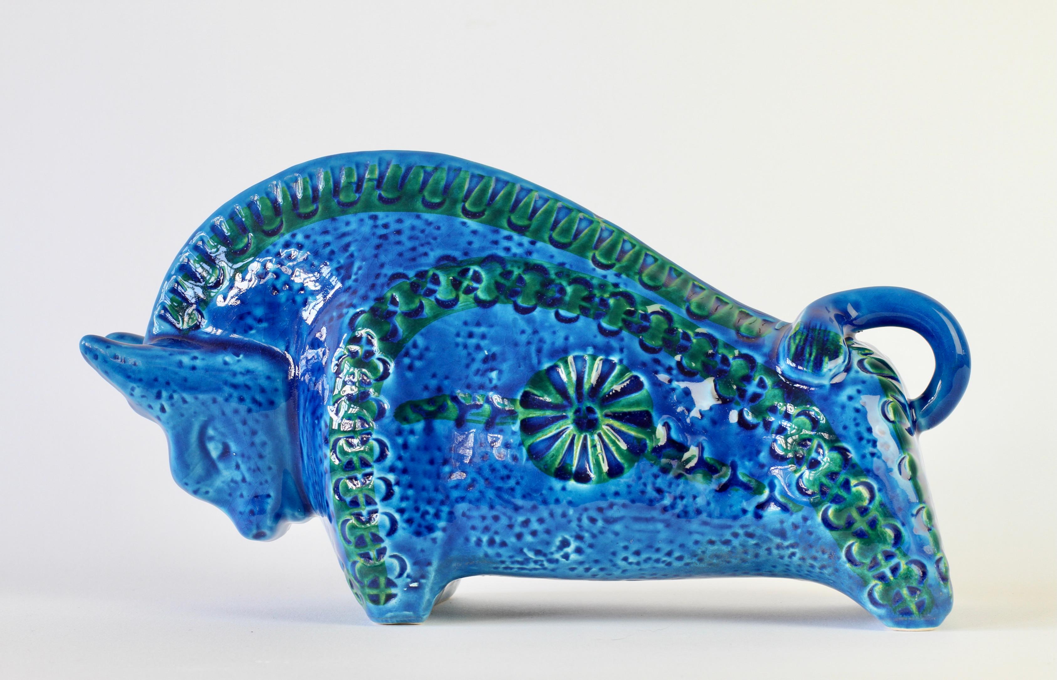 Beautiful large bull animal sculpture in vibrant 'Rimini' blue and turquoise with embossed pattern by Aldo Londi for Bitossi, circa 1970s. A great piece of vintage, mid-century handmade Italian pottery. 

     