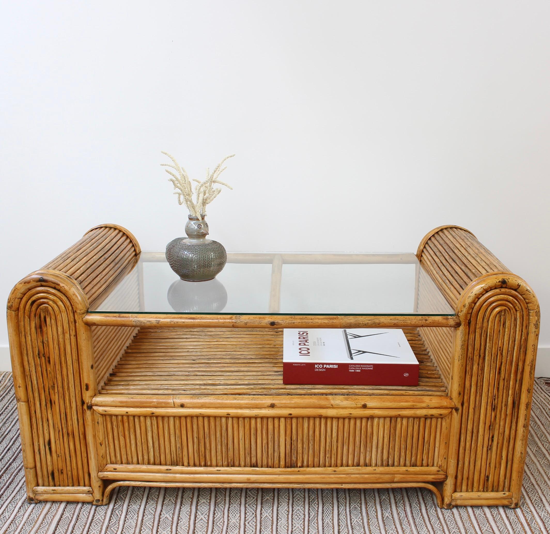 Italian vintage 'Chubby' style rattan coffee table (circa 1970s). A very delightful piece which will cheer up any room. Discovered in Italy, it has all the charm of that era. Part of its real charm as well, however, are the various characterful,
