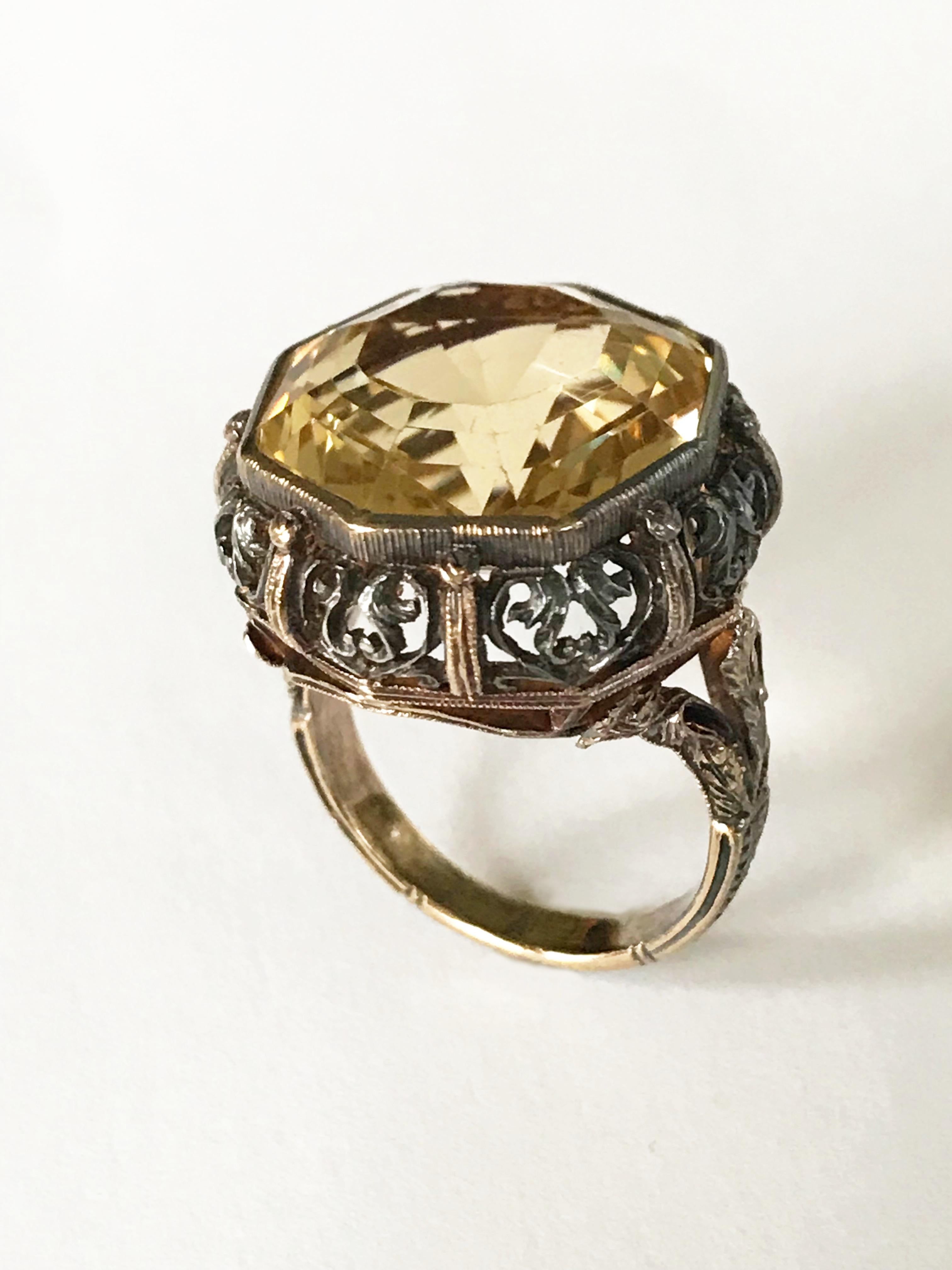 Early 20th century Buccellati style Italian silver and rose gold ring with an octagonal-shaped citrine .
The ring is in excellent condition considering the age , completely original darkened by the age and not reworked is meticulously handcrafted