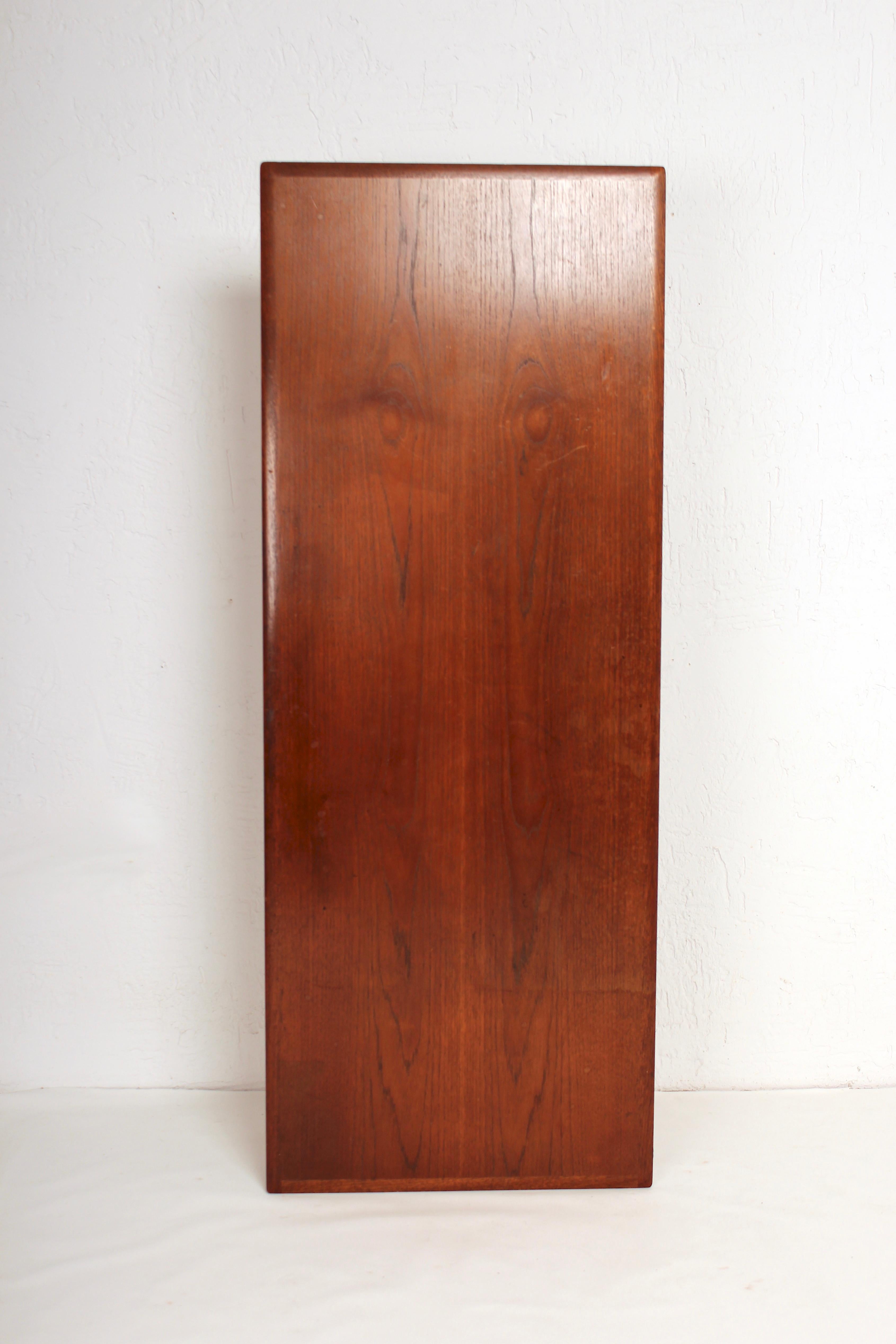 Pure and simple lines for this 1950s coffee table by ISA Bergamo in Italy in rosewood and black steel.