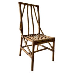 italian Retro Craftsmanship: 1950s Rattan Chair –  Boho Chic Elegance 