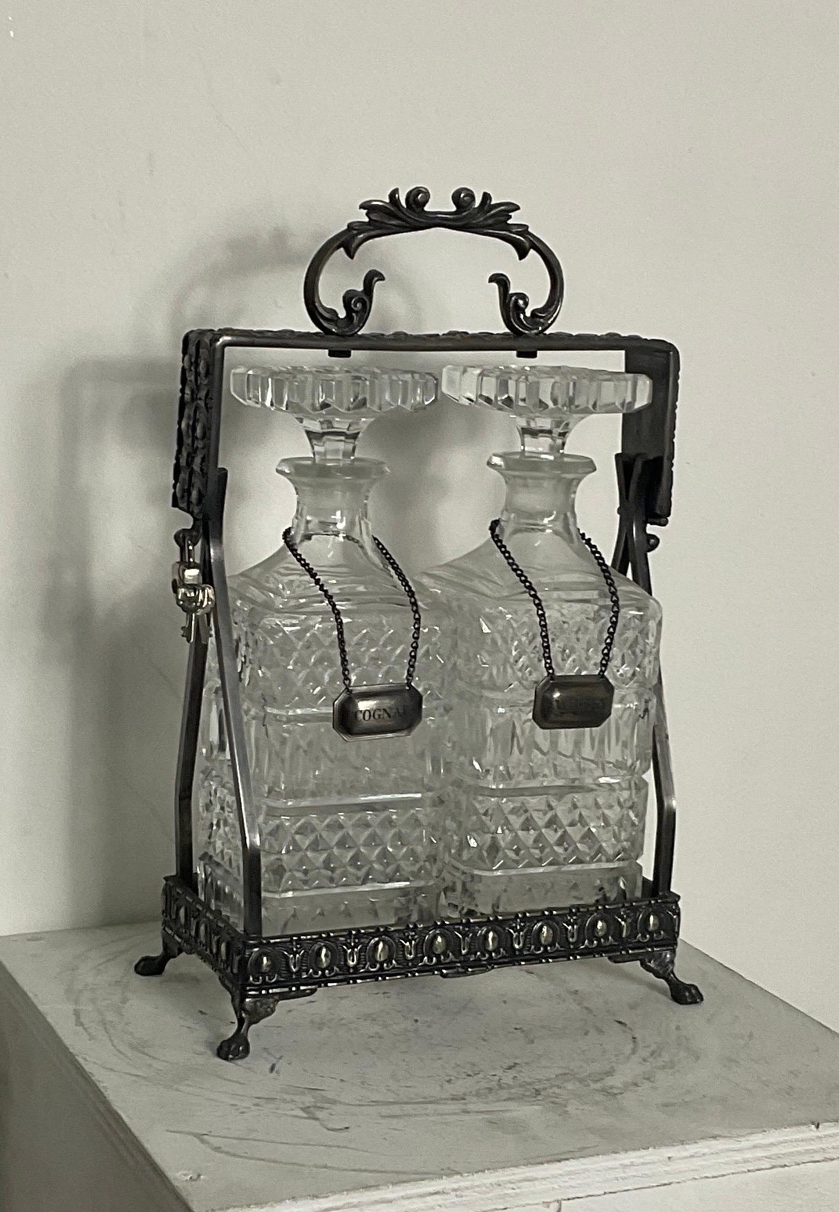 Liquor and cognac bottle holder from the 50s of the 900s in good condition with crystal bottles