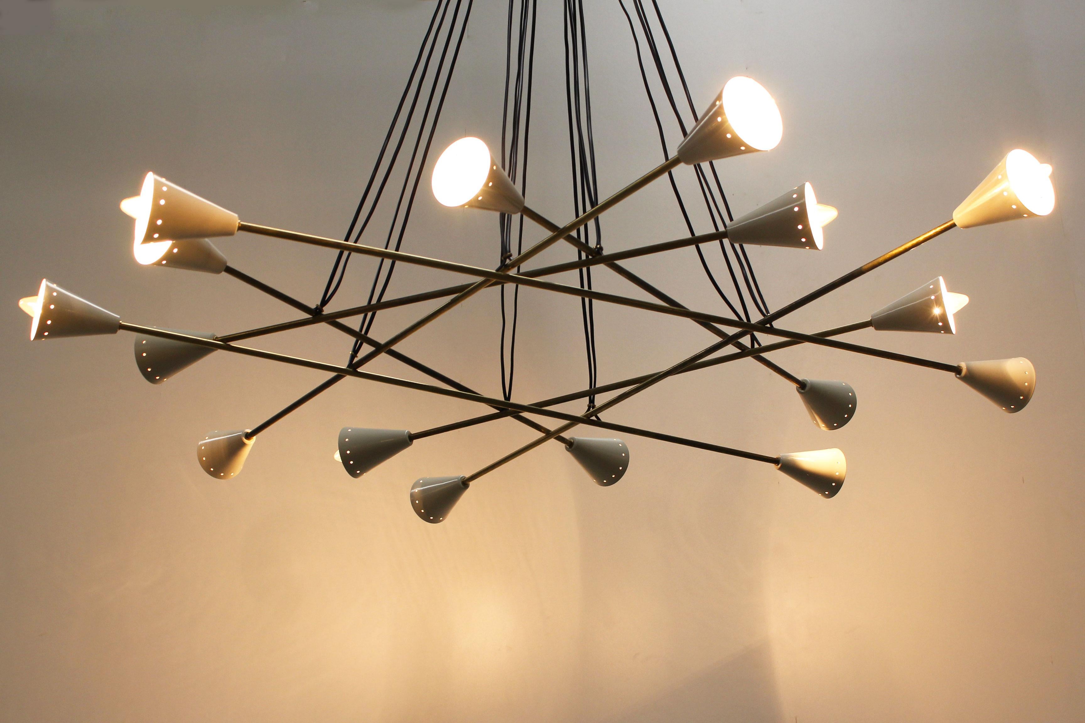 Massive cluster chandelier designed by Stilnovo with a diameter of 130 cm. Italian mid-century at its finest ! 
Its Minimalistic shape make it great for any midcentury or modern interior adapting flawlessly to your interior design! 
The chandelier