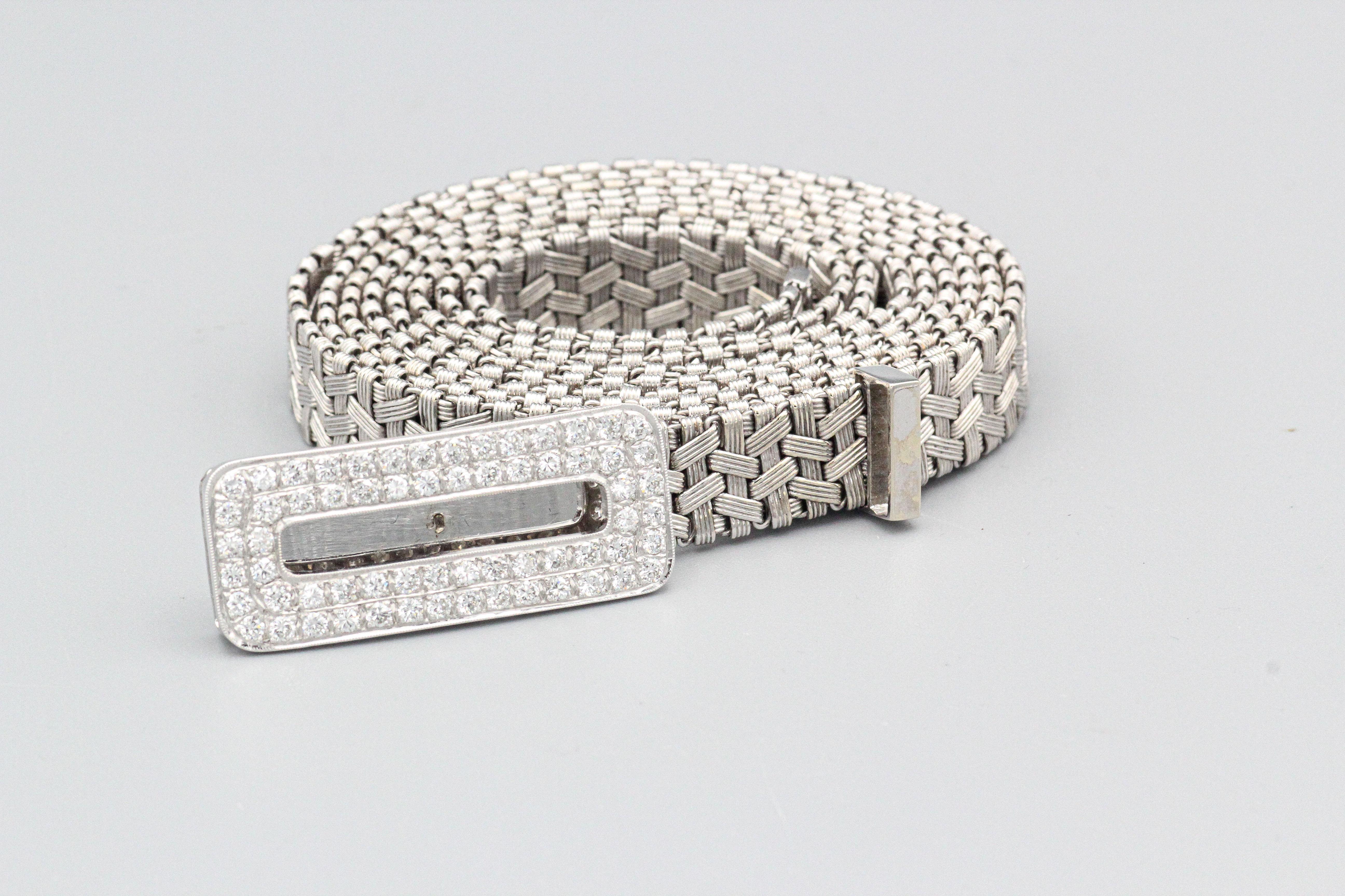 Fine and rare diamond and 18k white gold woven belt, circa 1970s. It features an adjustable length. Total length 41