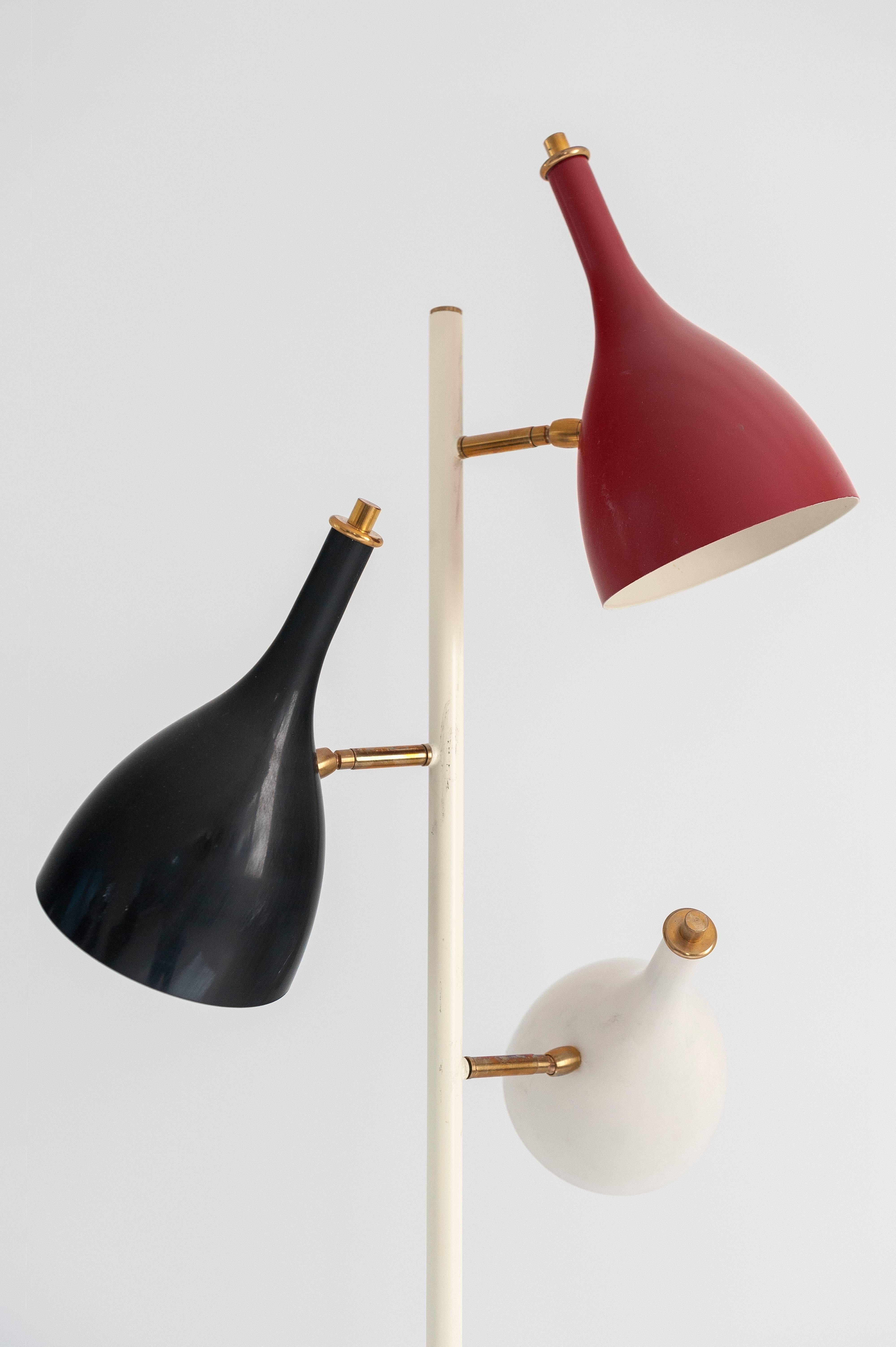Vintage floor lamp with a black marble base, the structure is in brass and the shade are in coloured aluminium; red black white
attributed to Stilnovo, Italy, circa 1960.
Measures: H 193 cm, long 50 cm, base 35 cm.
H 75.98