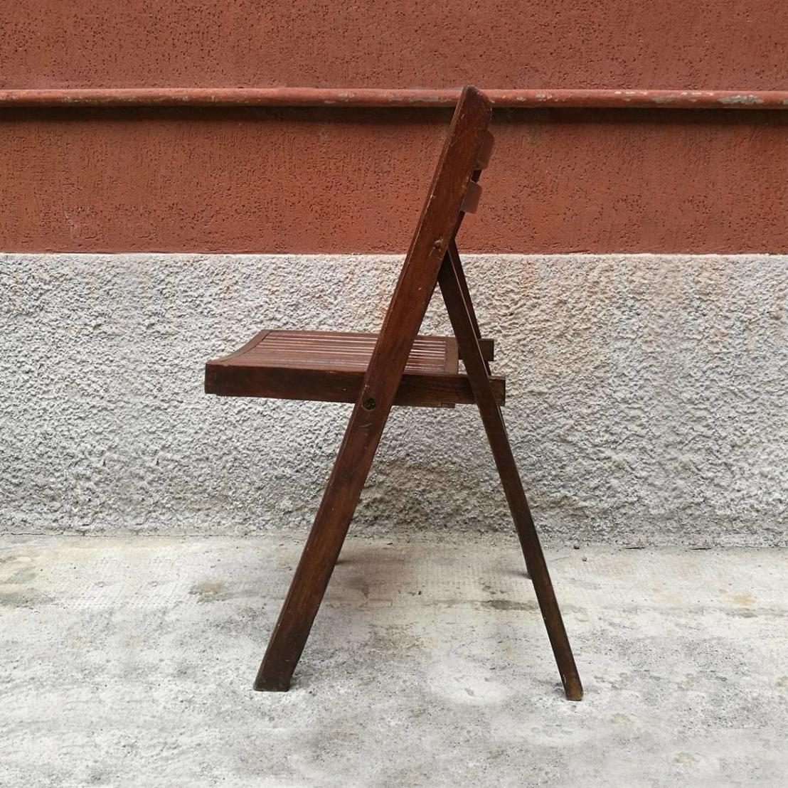 Folding chair in solid wood from 1960s.
Good general conditions.
Measures: 46 x 46 x 83 H cm.