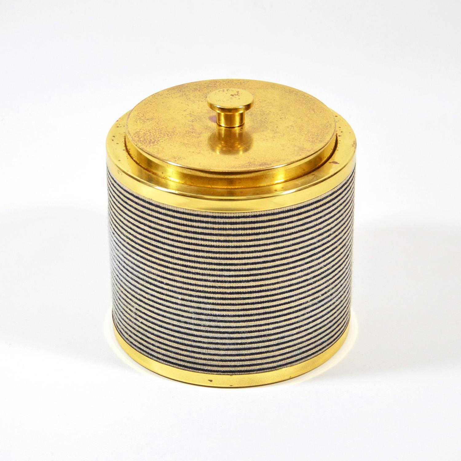Ice bucket made of brass with stripe fabric cover, off white and navy blue, manufactured in Italy by Rinnovel, circa 1970. It can be attributed to Ettore Sottsass, who designed several items for Rinnovel.