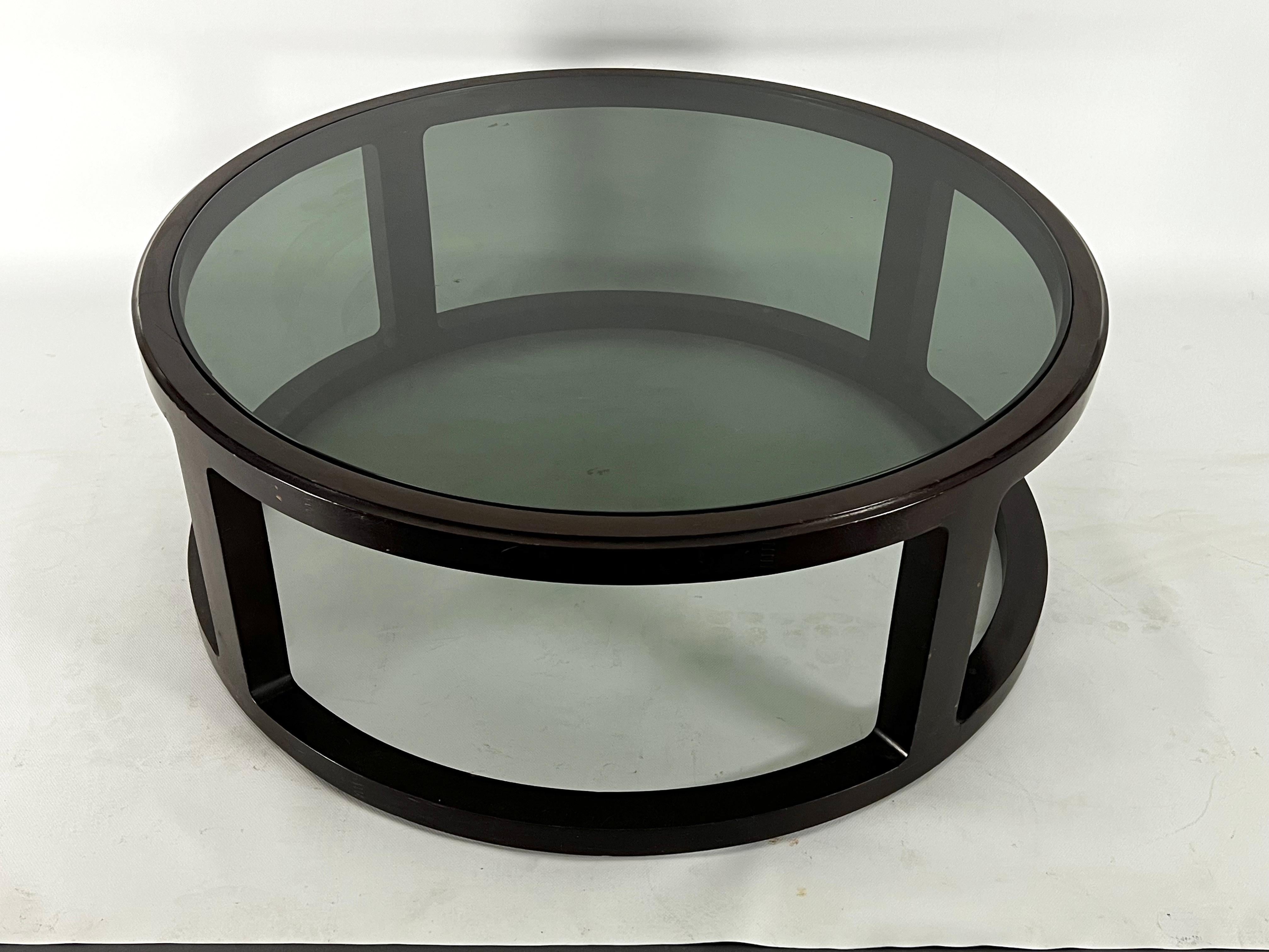 Italian Vintage Large Round coffee table in wood and fume glass. 1970s In Good Condition For Sale In Catania, CT