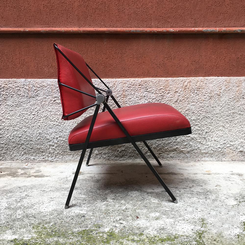Italian vintage metal and red leather armchair, 1970s
Armchair with black metal structure and steel details, armrests in iron rod and reclining seat and back covered in the original red sky.
Made by Formanova in the 1970s.
Good general condition,