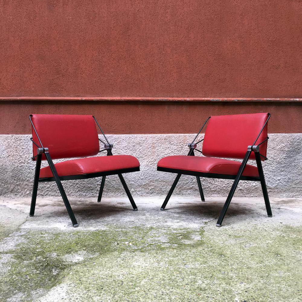 Italian vintage metal and red leather armchairs, 1970s.
Armchairs with black metal structure and steel details, armrests in iron rod and reclining seat and back covered in the original red sky.
Made by Formanova in the 1970s.
Good general