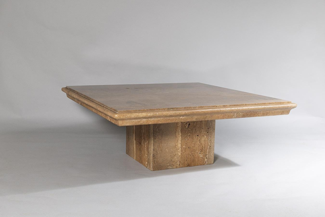 A large square vintage 1980s modern travertine coffee table in a distinctive walnut colour vein.  A heavy piece which has a large 3ft 6