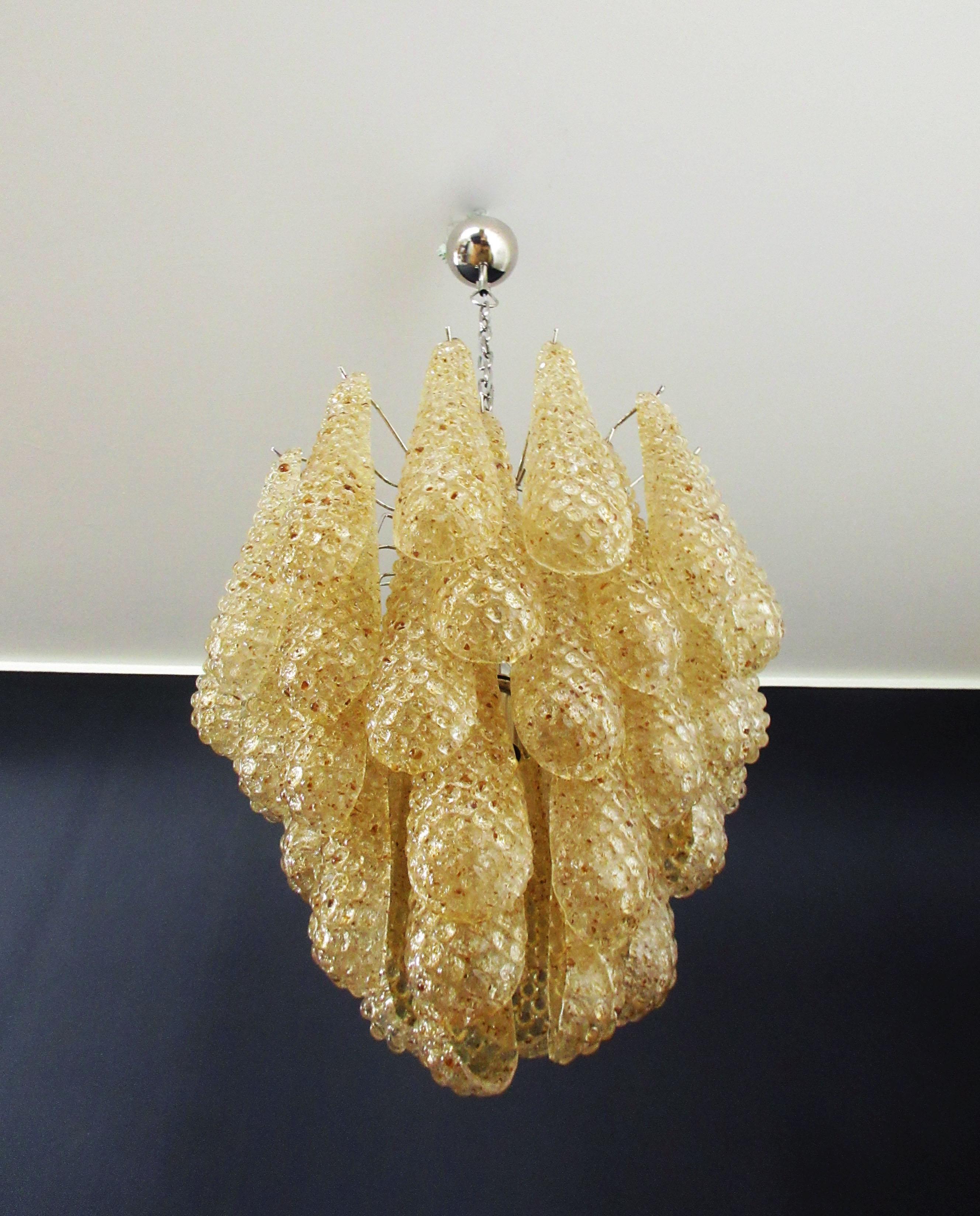 Italian vintage Murano chandelier made by 41 glass petals (amber crystal, smooth outside, with crystal transparent and amber powder and then rough inside.) in a chrome frame.

Period: late 20th century

Dimensions: 49.20 inches (125 cm) height with
