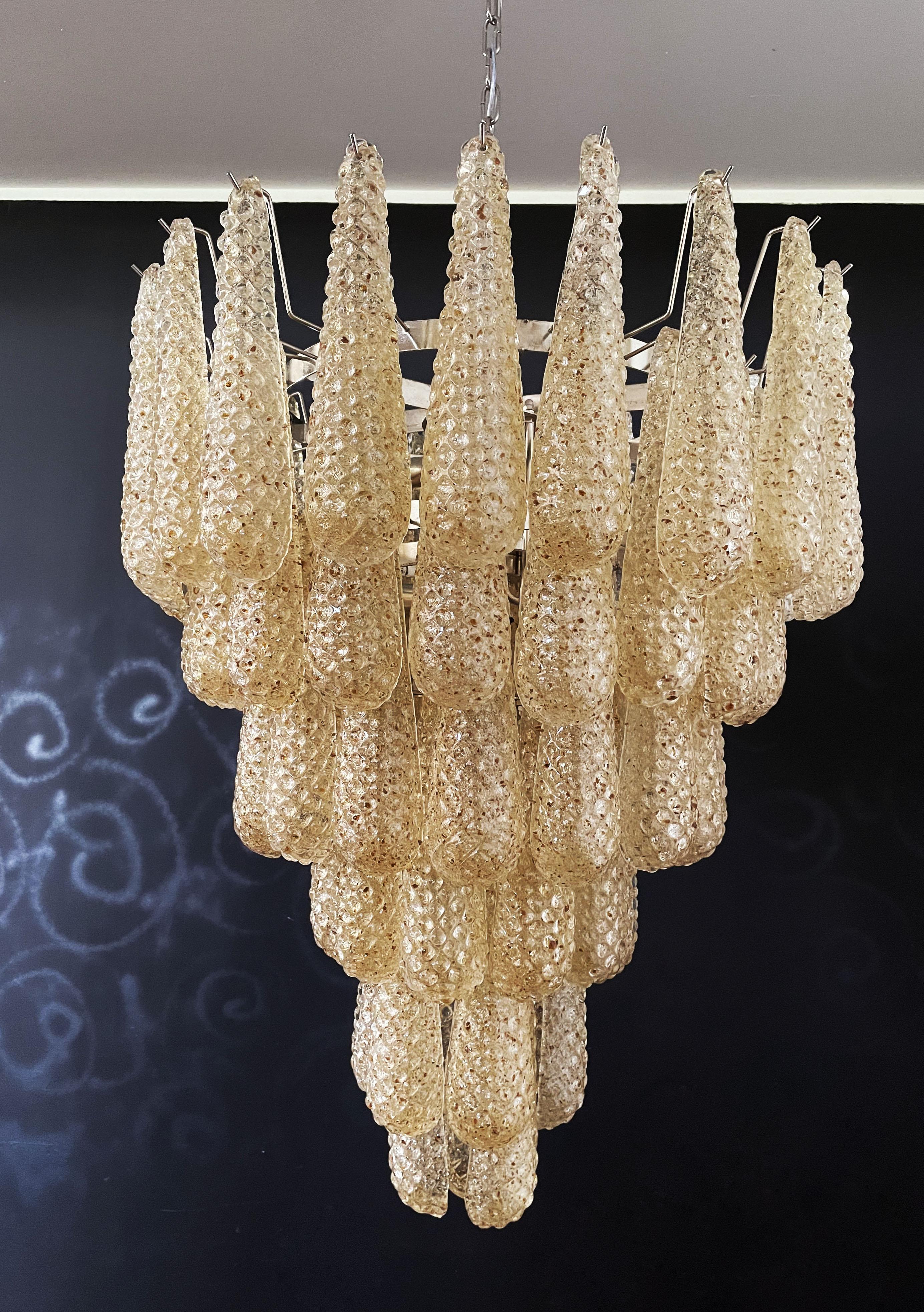 Huge Italian vintage Murano chandelier made by 75 glass petals (amber crystal, smooth outside, with crystal powder and then rough inside.) in a nichel metal frame.
Period: Late XX century
Dimensions: 65 inches (165 cm) height with chain; 37,40