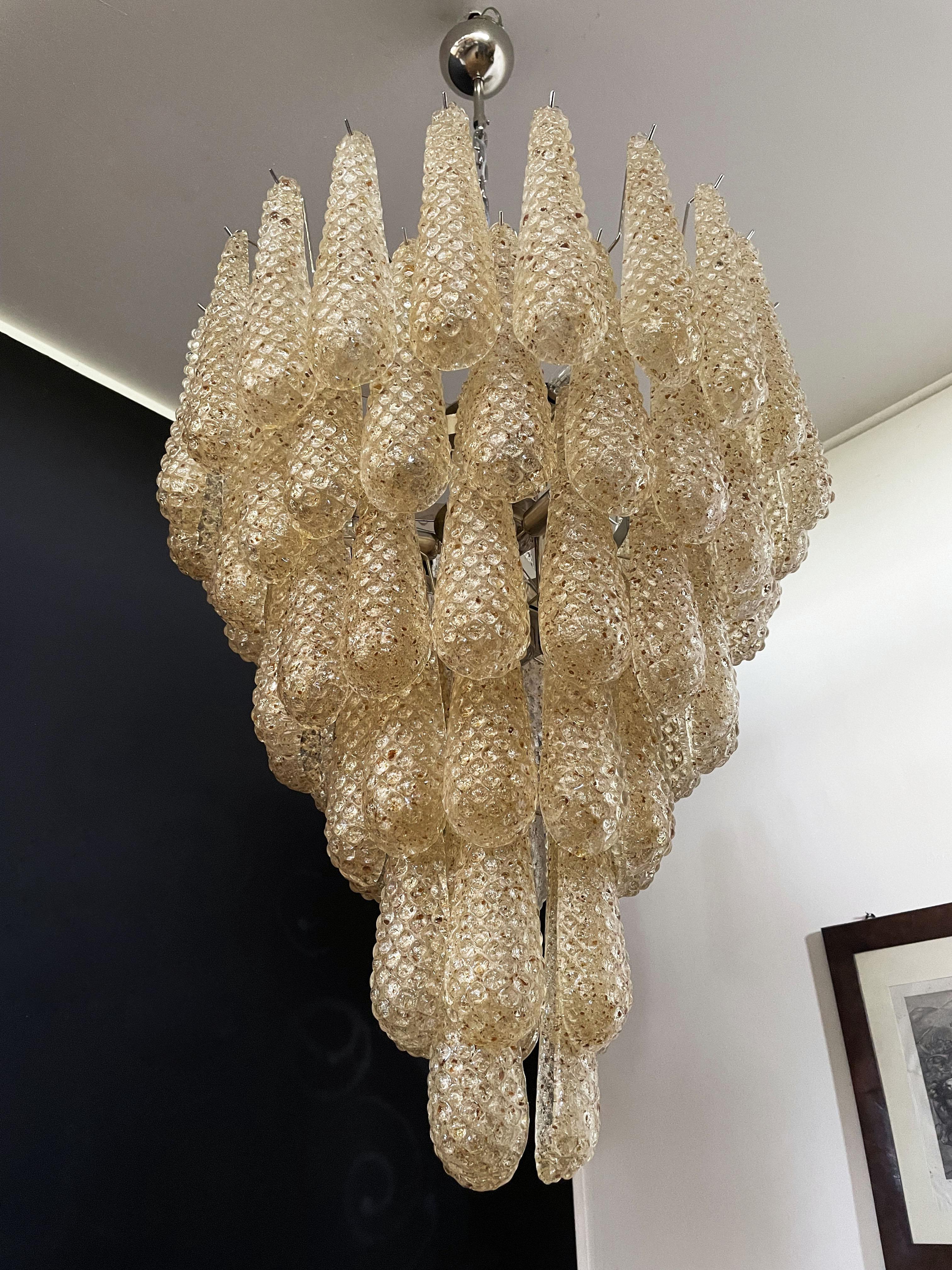 Huge Italian vintage Murano chandelier made by 75 glass petals (amber crystal, smooth outside, with crystal powder and then rough inside.) in a nichel metal frame.
Period: Late XX  century
Dimensions:	65 inches (165 cm) height with chain; 37,40