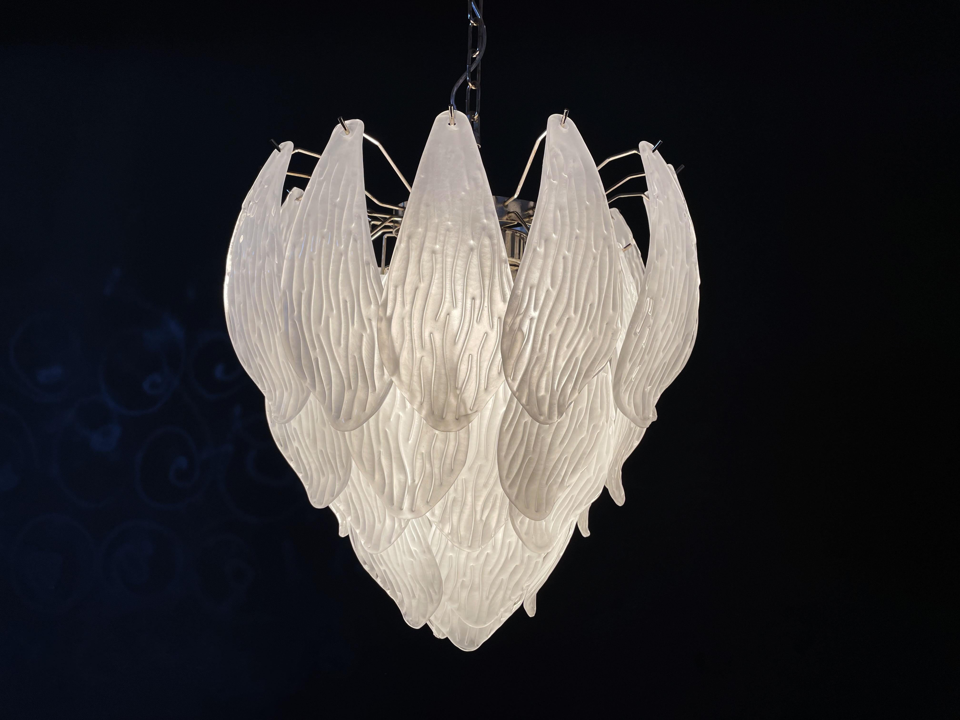 Huge Italian vintage Murano chandelier made by 41 handblown transparent frosted carved glass leaves in a chrome frame.
Period: late XX century
Dimensions:	49,20 inches  (125 cm) height with chain; 25,80 inches  (68 cm) height without chain; 21,25