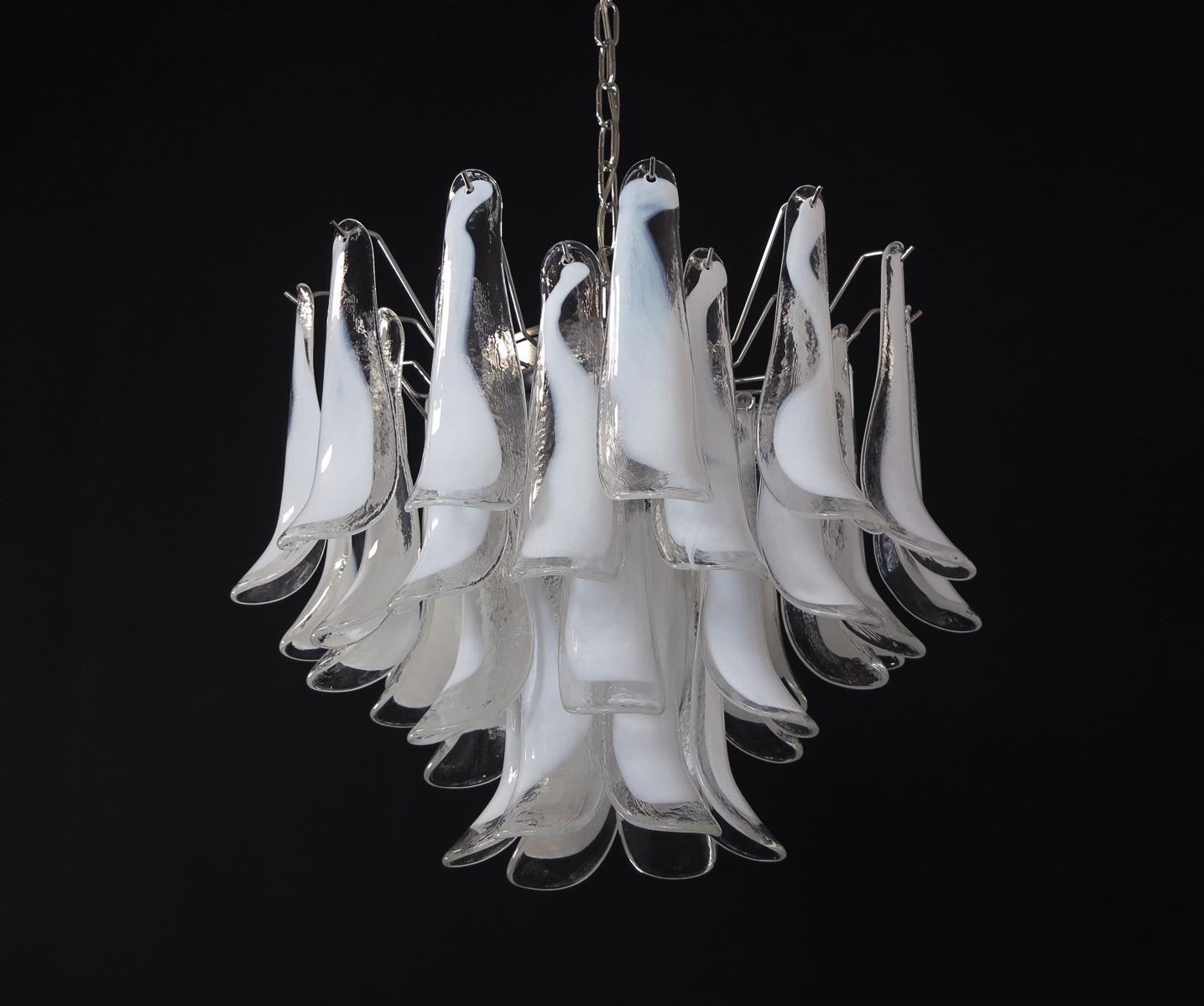 1970s Murano Italian glass chandelier. Fantastic chandelier with white “lattimo” glasses, nickel-plated metal frame. It has 36 big monumental petals glass. The glasses are very high quality, the photos do not do the beauty, luster of these