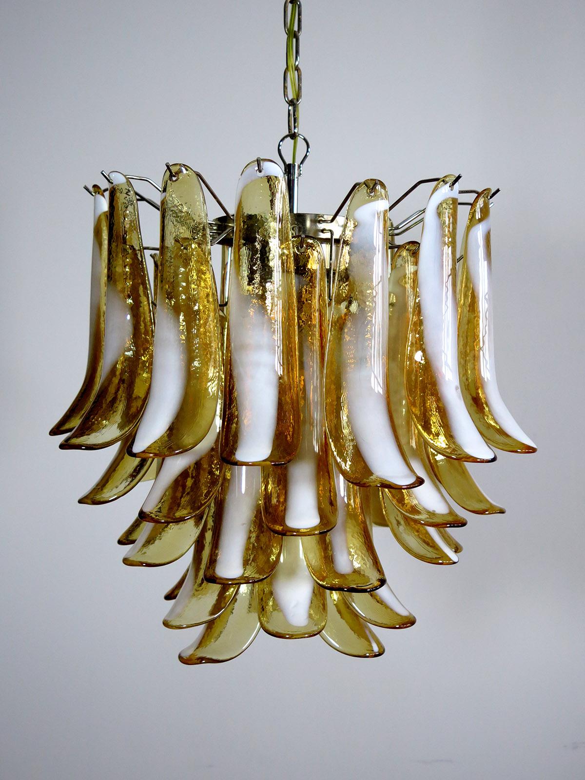 1970’s Murano Italian glass chandelier. Fantastic chandelier with caramel and white “lattimo” glasses, nickel-plated metal frame. It has 41 big monumental petals glass. The glasses are very high quality, the photos do not do the beauty, luster of