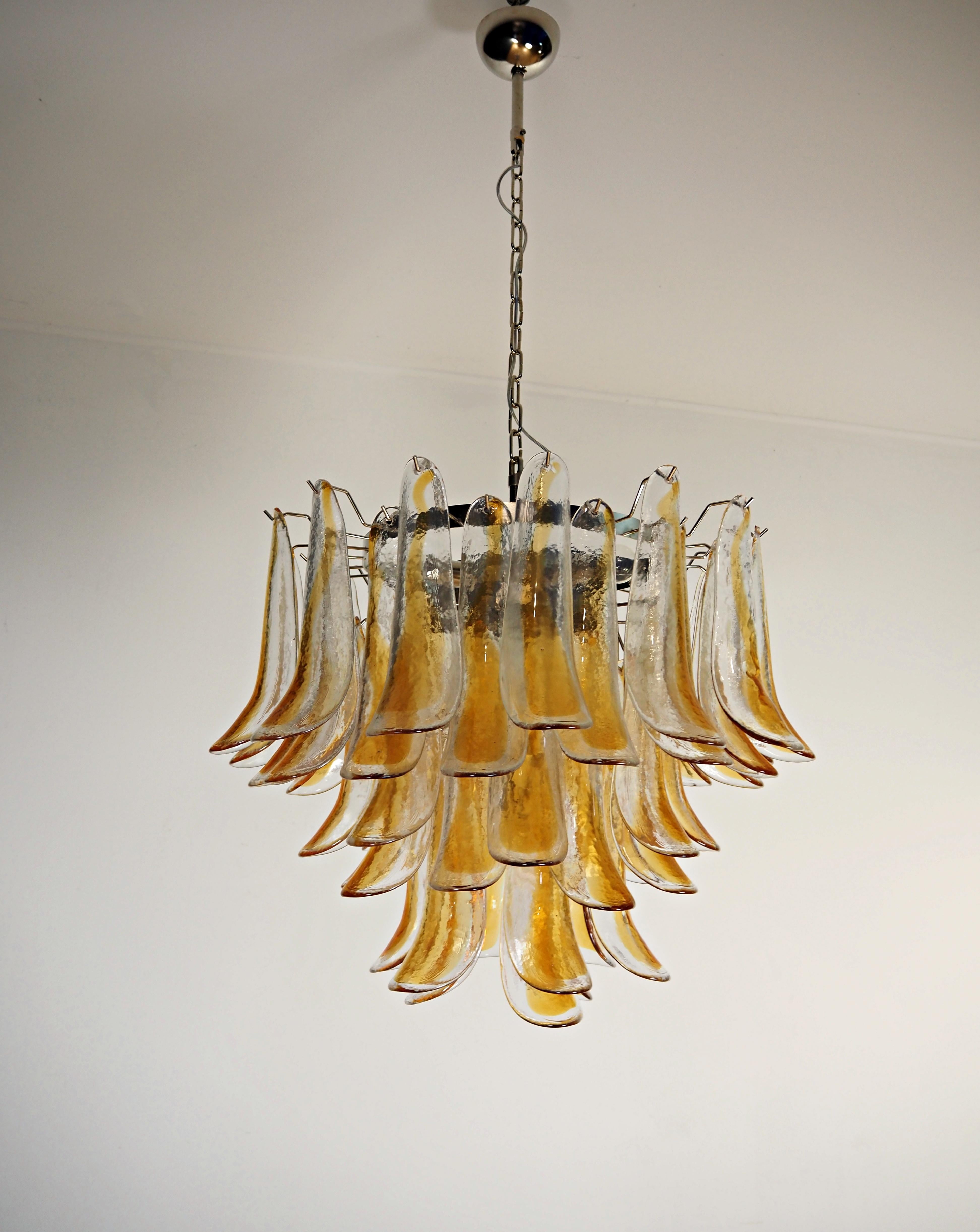 Murano Italian glass chandelier. Fantastic chandelier with 53 fantastic glass petals (clear with amber spot), nickel-plated metal frame. The glasses are very high quality, the photos do not do the beauty, luster of these glasses.
Period: 	late xx