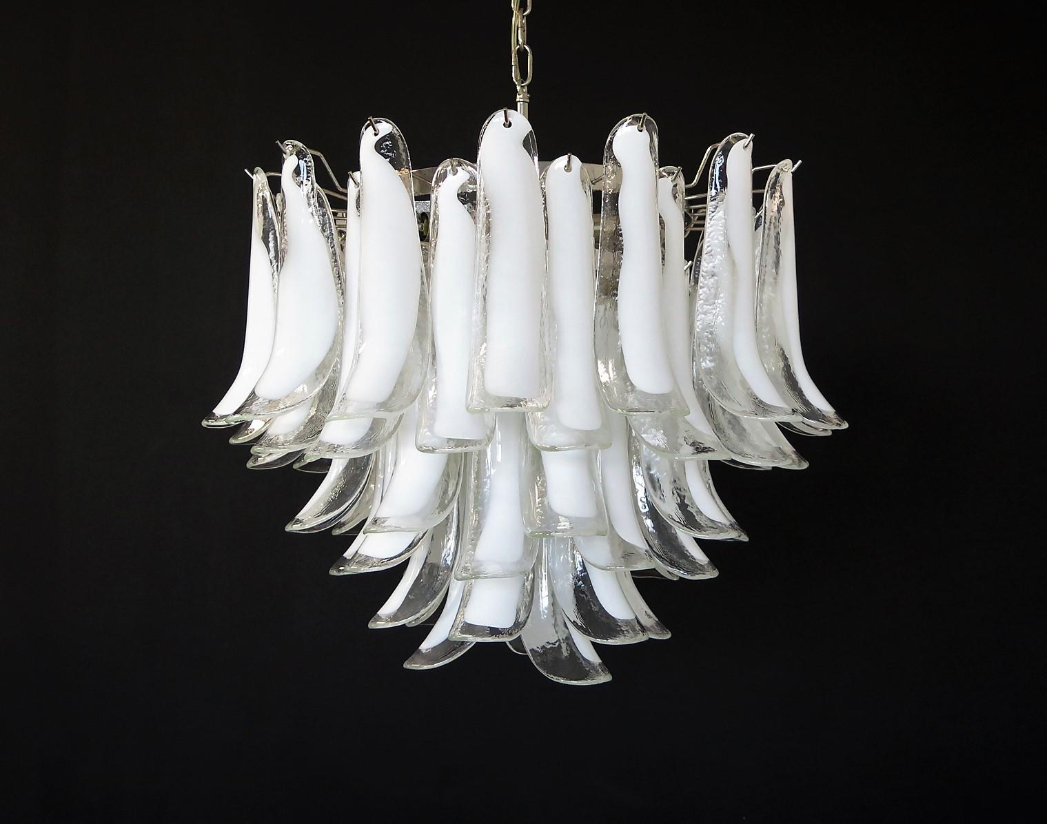 Murano Italian glass chandelier. Fantastic chandelier with transparent and white “lattimo” glasses, nickel-plated metal frame. It has 53 big monumental petals glass. The glasses are very high quality, the photos do not do the beauty, luster of these