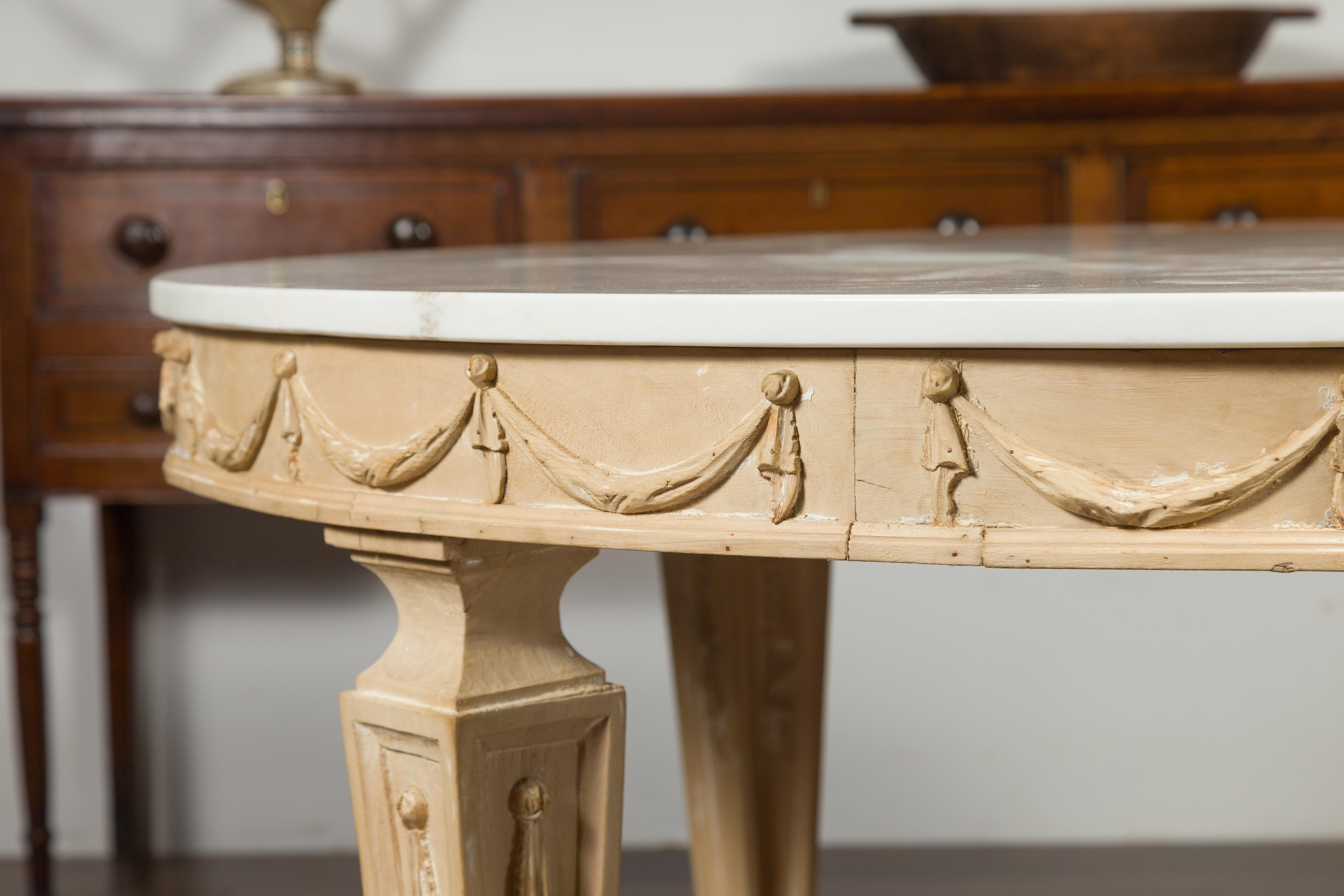 Carved Italian Vintage Neoclassical Style Pine Dining Table with Marble Top and Swags For Sale