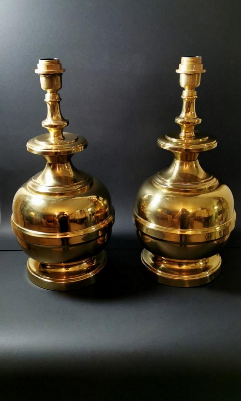 We kindly suggest you read the whole description, because with it we try to give you detailed technical and historical information to guarantee the authenticity of our objects.
Pair of large Italian table lamps, the thick brass plate was worked on a