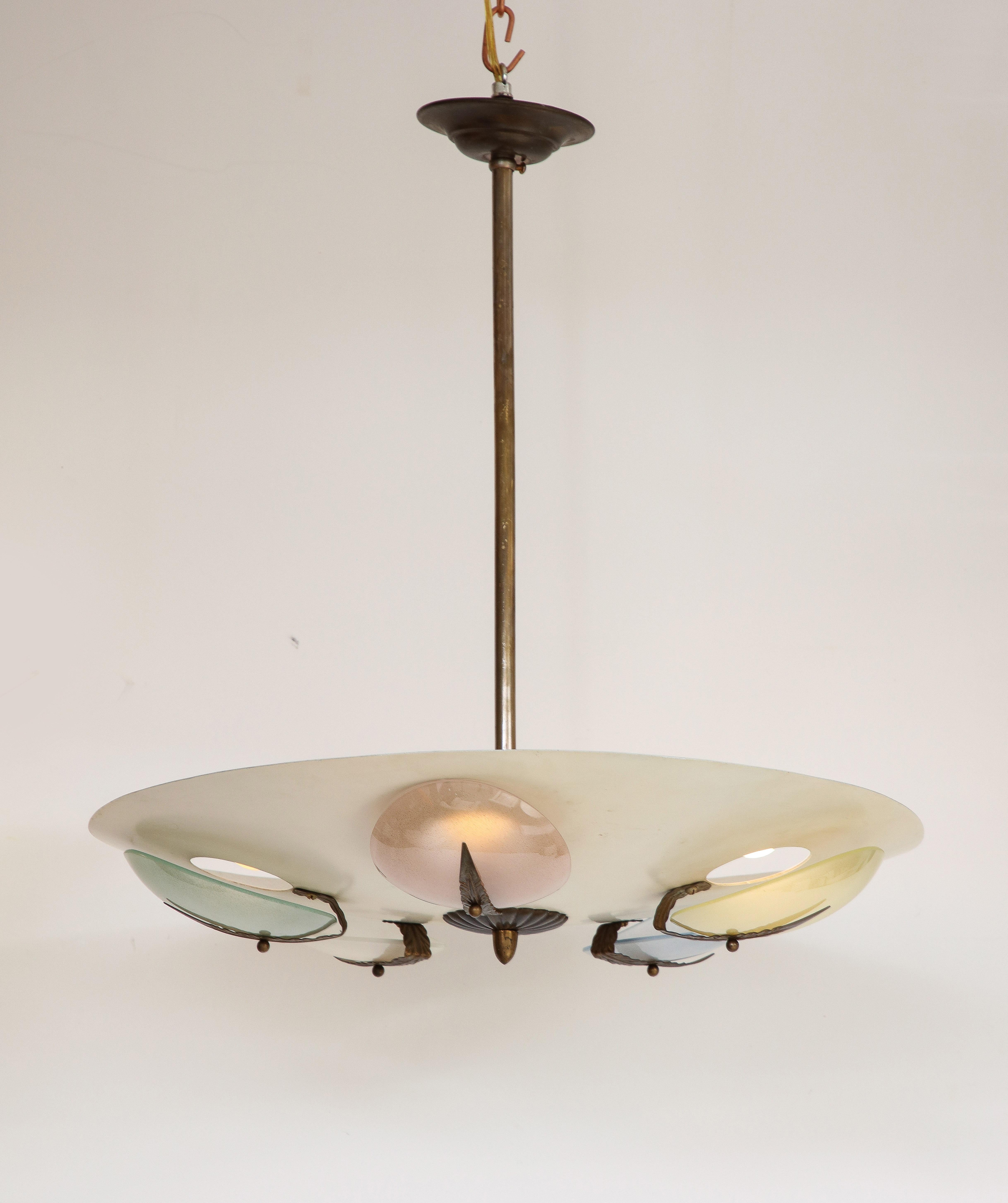 A highly unique Italian pendant chandelier, circa 1950. 
The circular creamy white painted enamel metal pendant is decorated with five oval shaped pastel colored discs, (pale pink, seafoam green, periwinkle blue, white, and pale yellow), with each