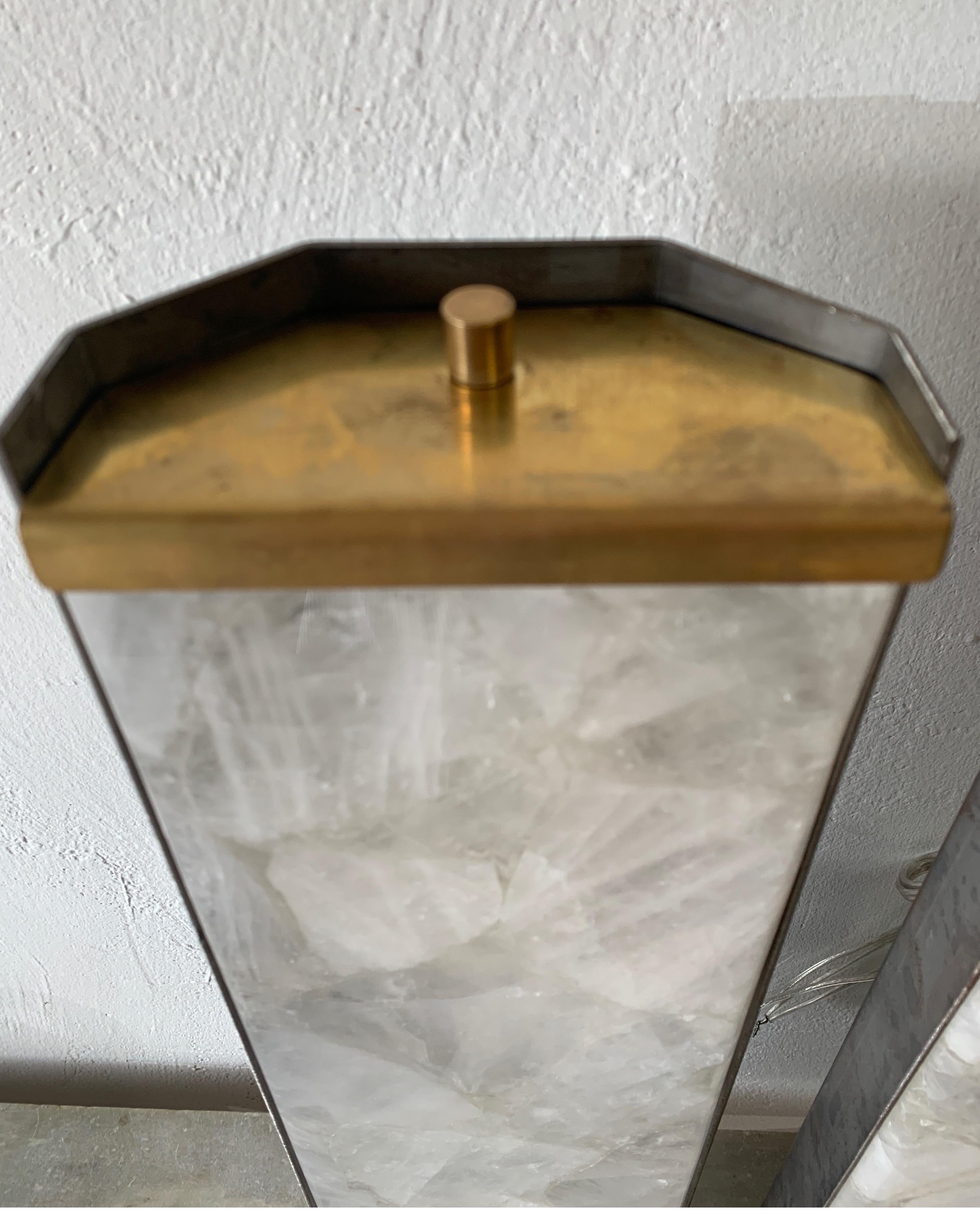 Wonderful Italian wall sconces with white quartz and brass back. These are rewired for American standard. They are heavy sconces each weighs 16lbs. Very chic.