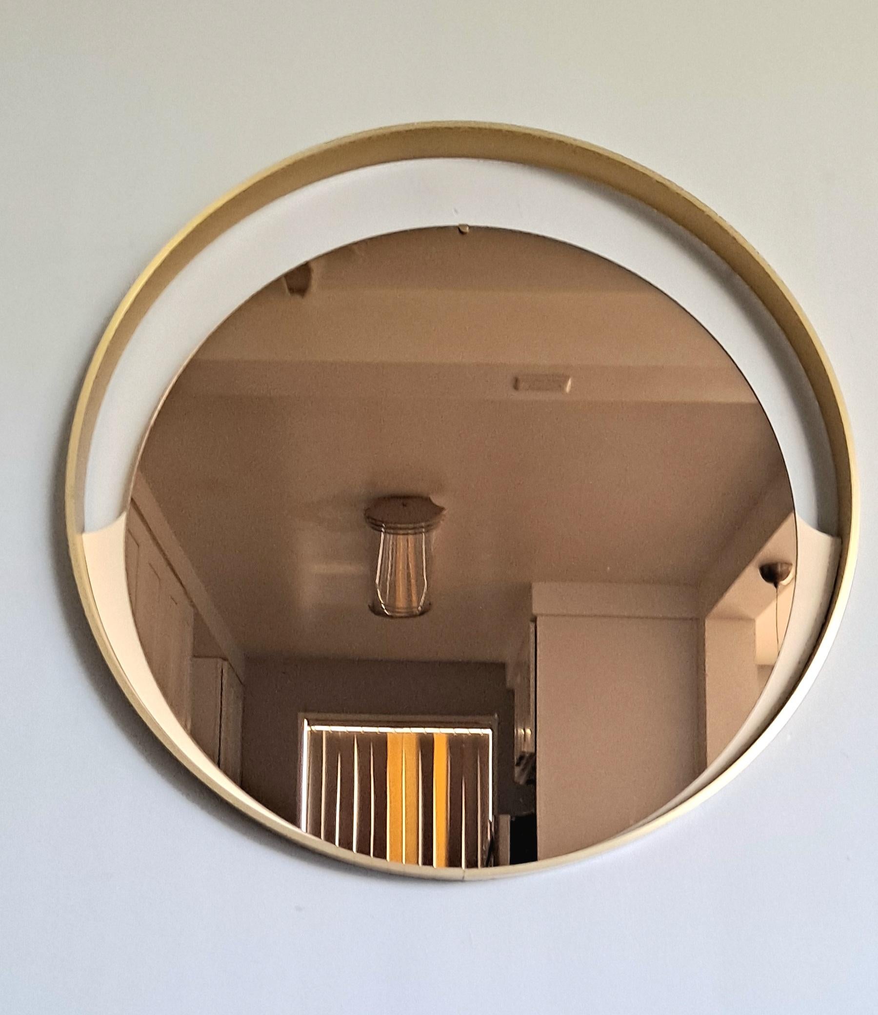 Large round Brass frame  withe Bronze mirror . Frame is 2 inch . 
This is high quality vintage Brass mirror and for sure great  Italian design and look.  
