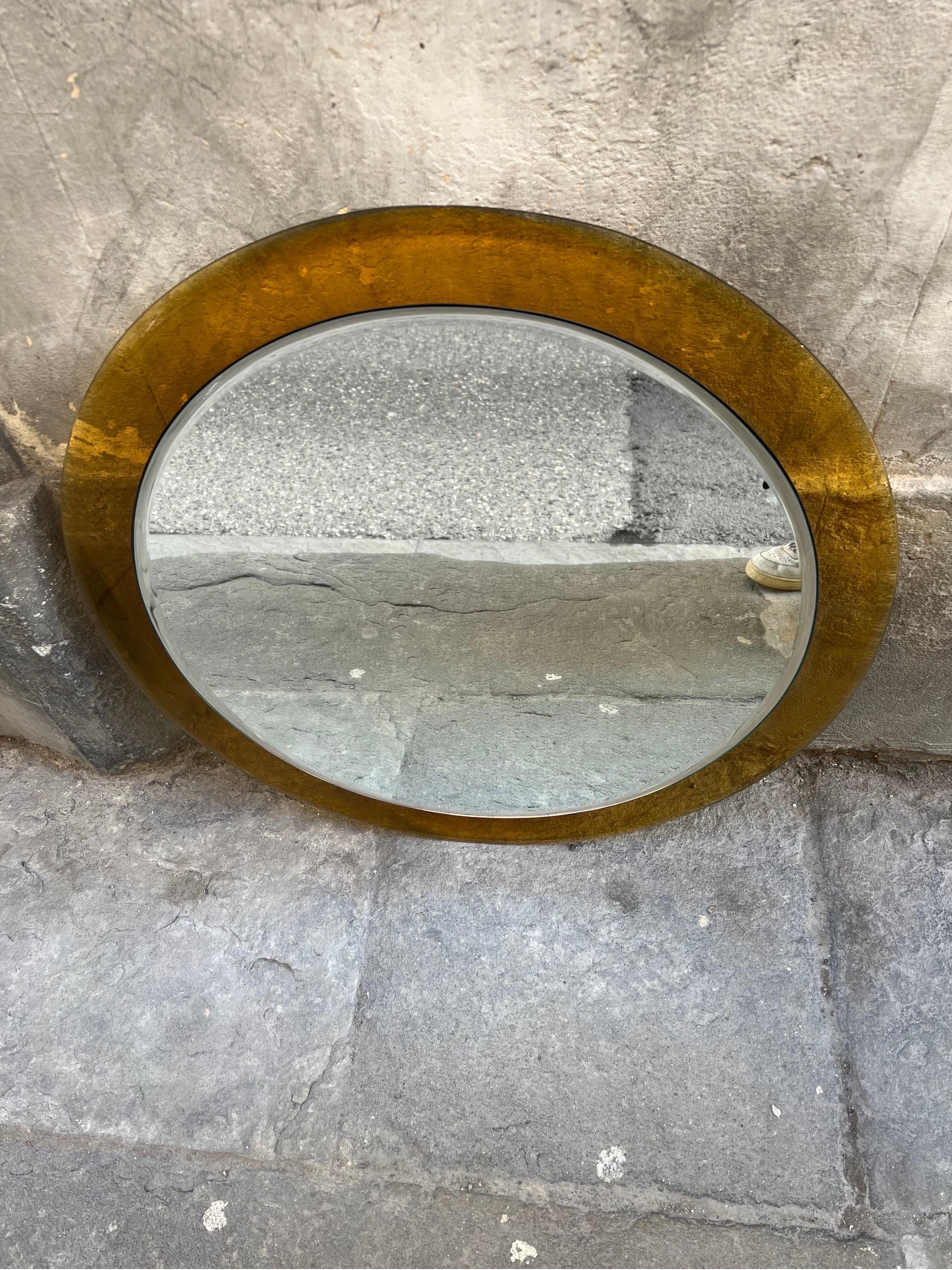 Italian vintage round mirror with amber murano glass frame and beleved edges by Sena Cristal.
Perfect vintage condition.
 
