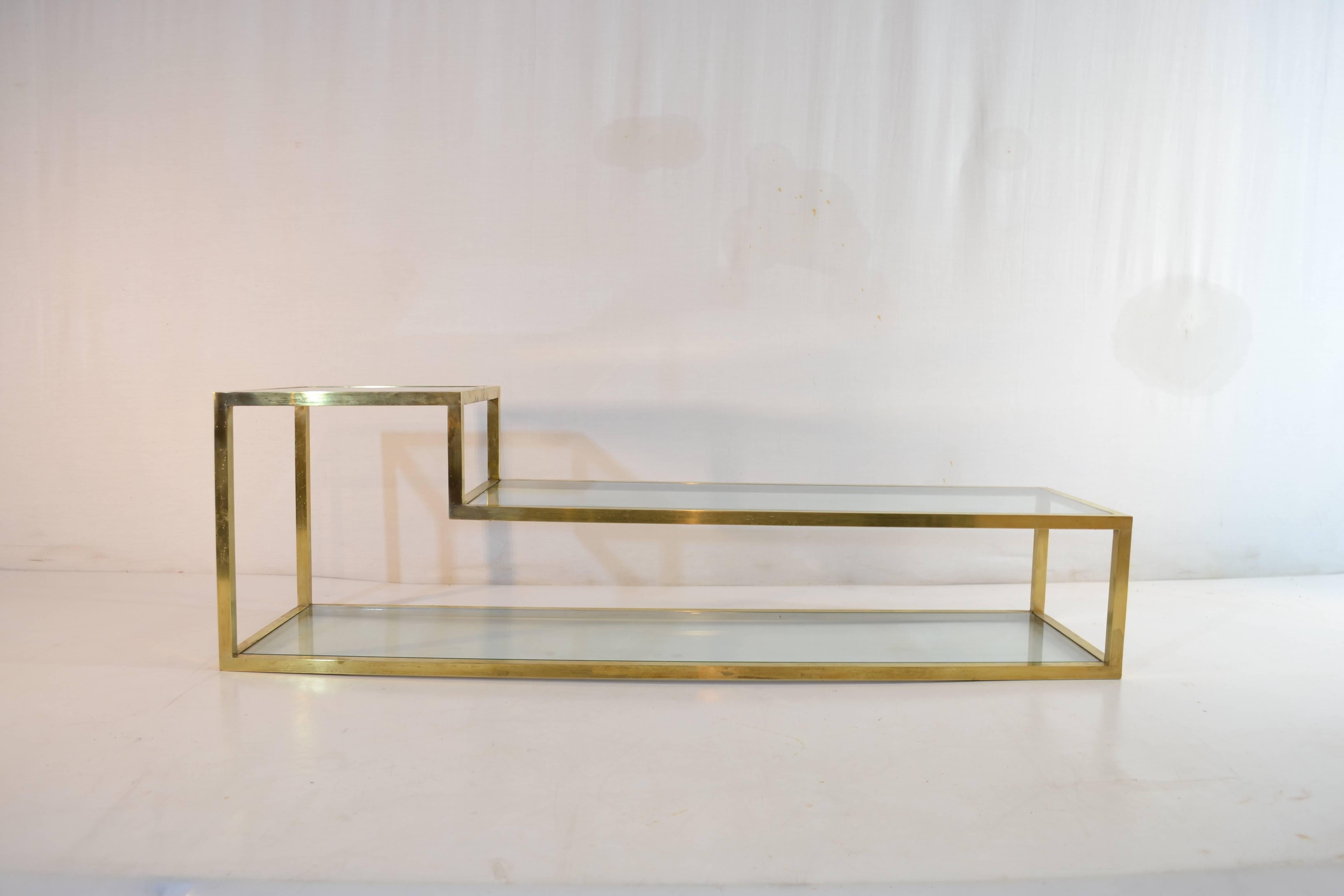 High quality brass three-tiered table with clear glass.