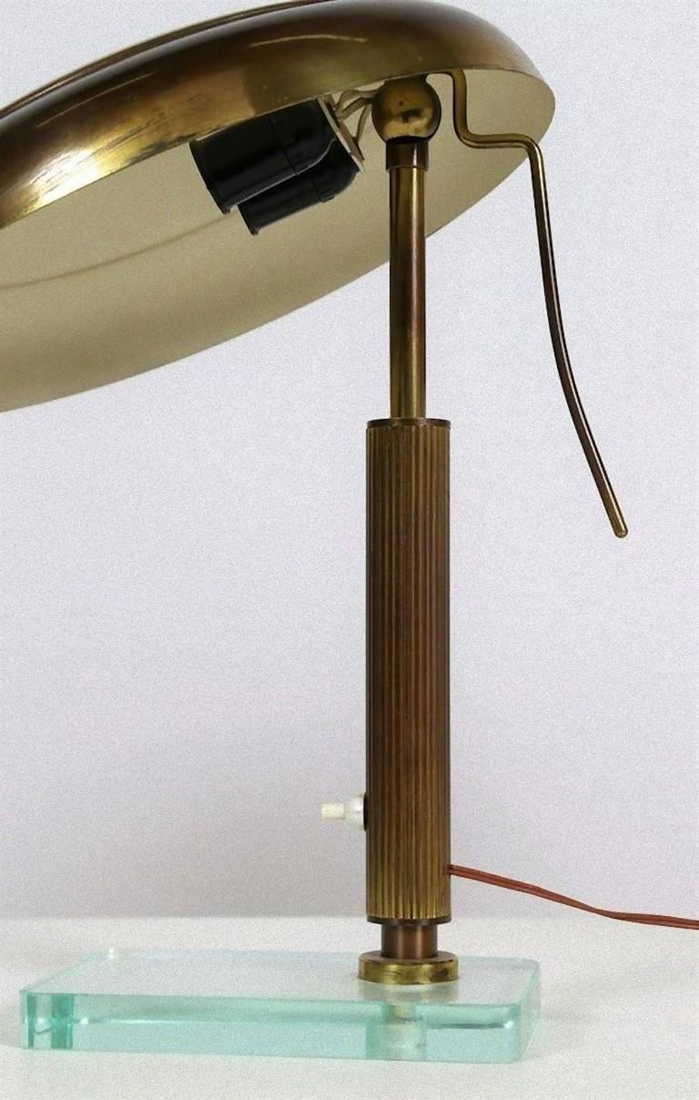 Vintage brass table lamp is a fashionable lamp designed, realized in the 1950s in Italy.

Good conditions.

This object is shipped from Italy. Under existing legislation, any object in Italy created over 70 years ago by an artist, designer or
