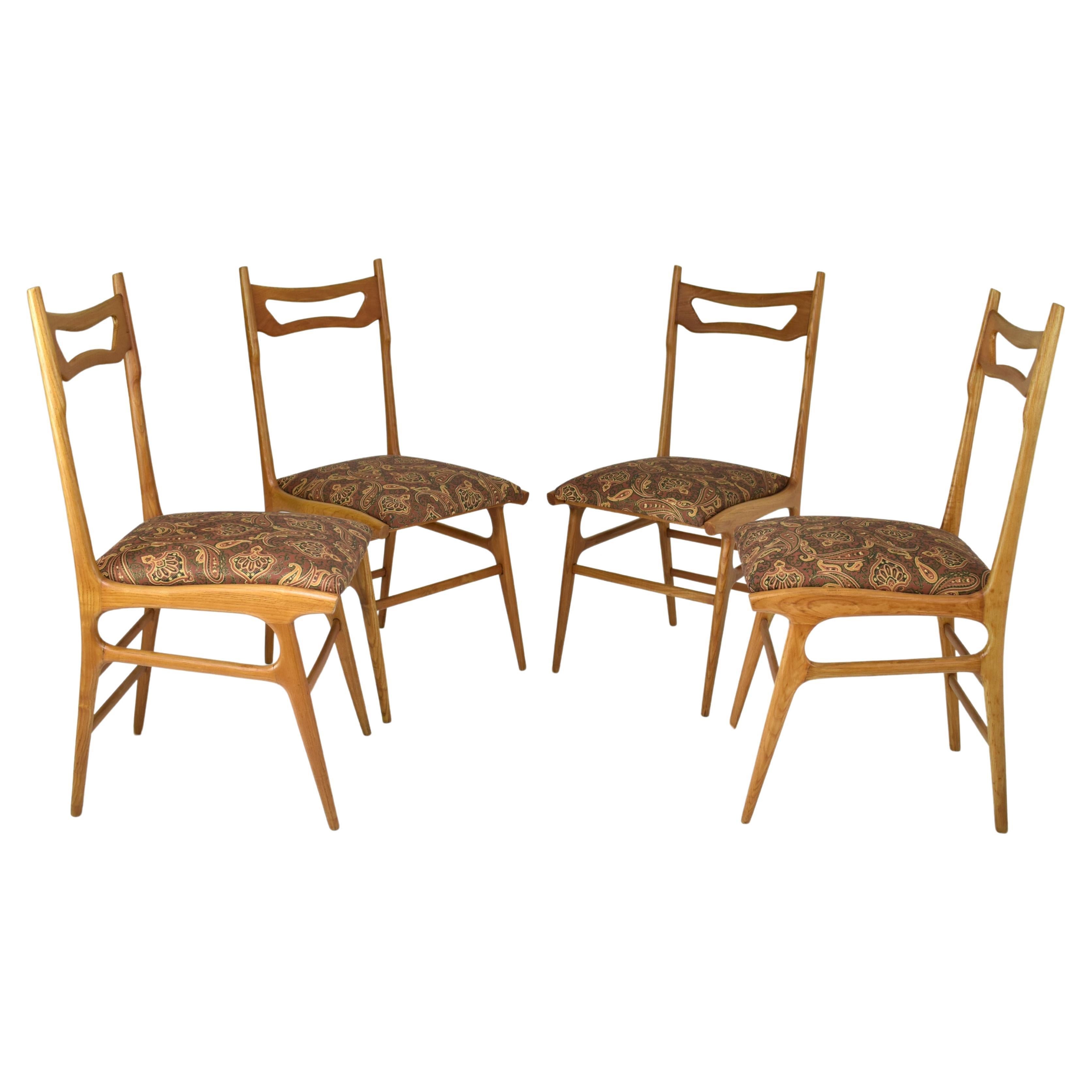 Juego de cuatro sillas de comedor italianas vintage de madera, años 50