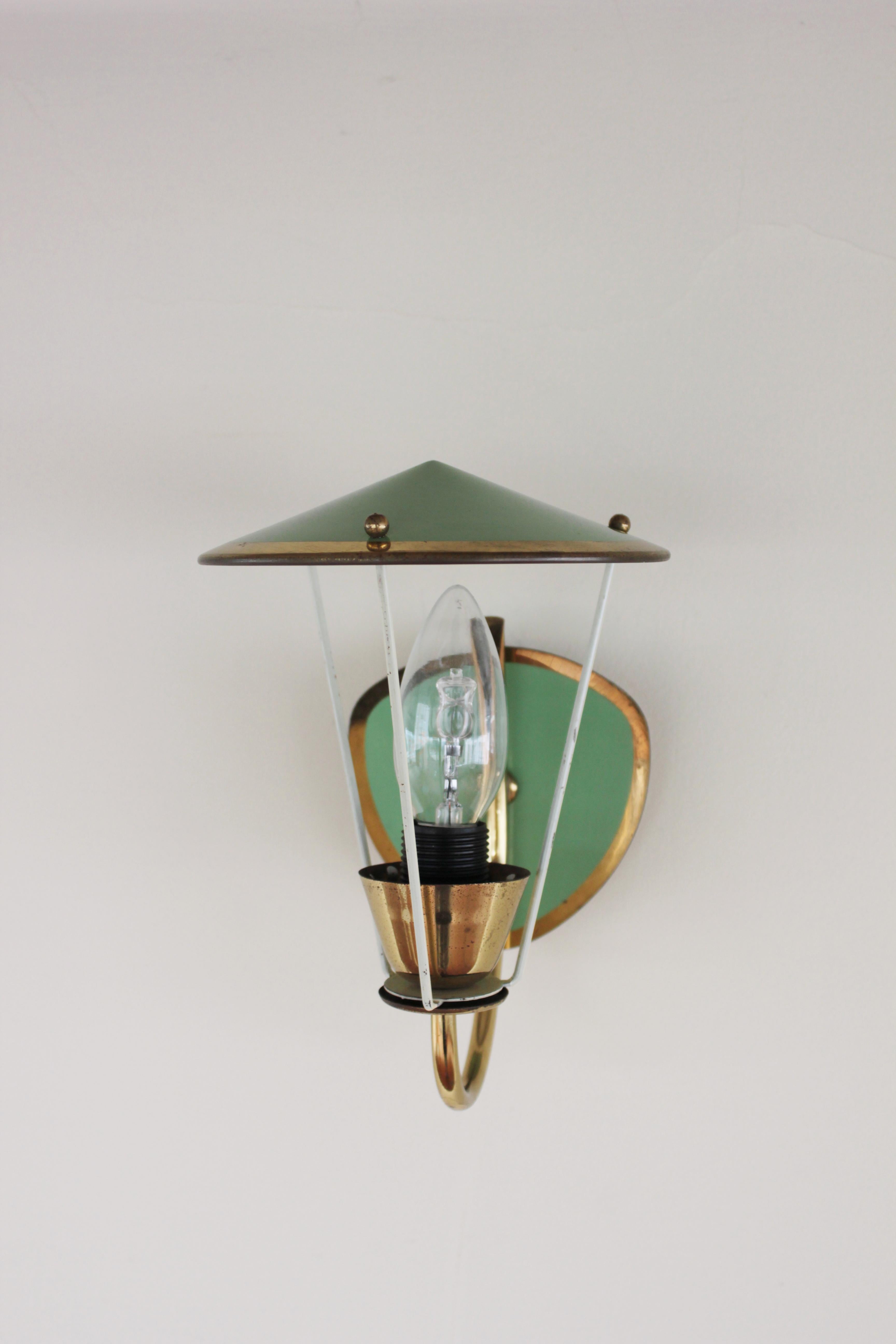 Italian wall lamp
Designer:
Production:
Origin: Italy
Period: 1960s
Material: brass
Color: gold and green
Dimensions: 
