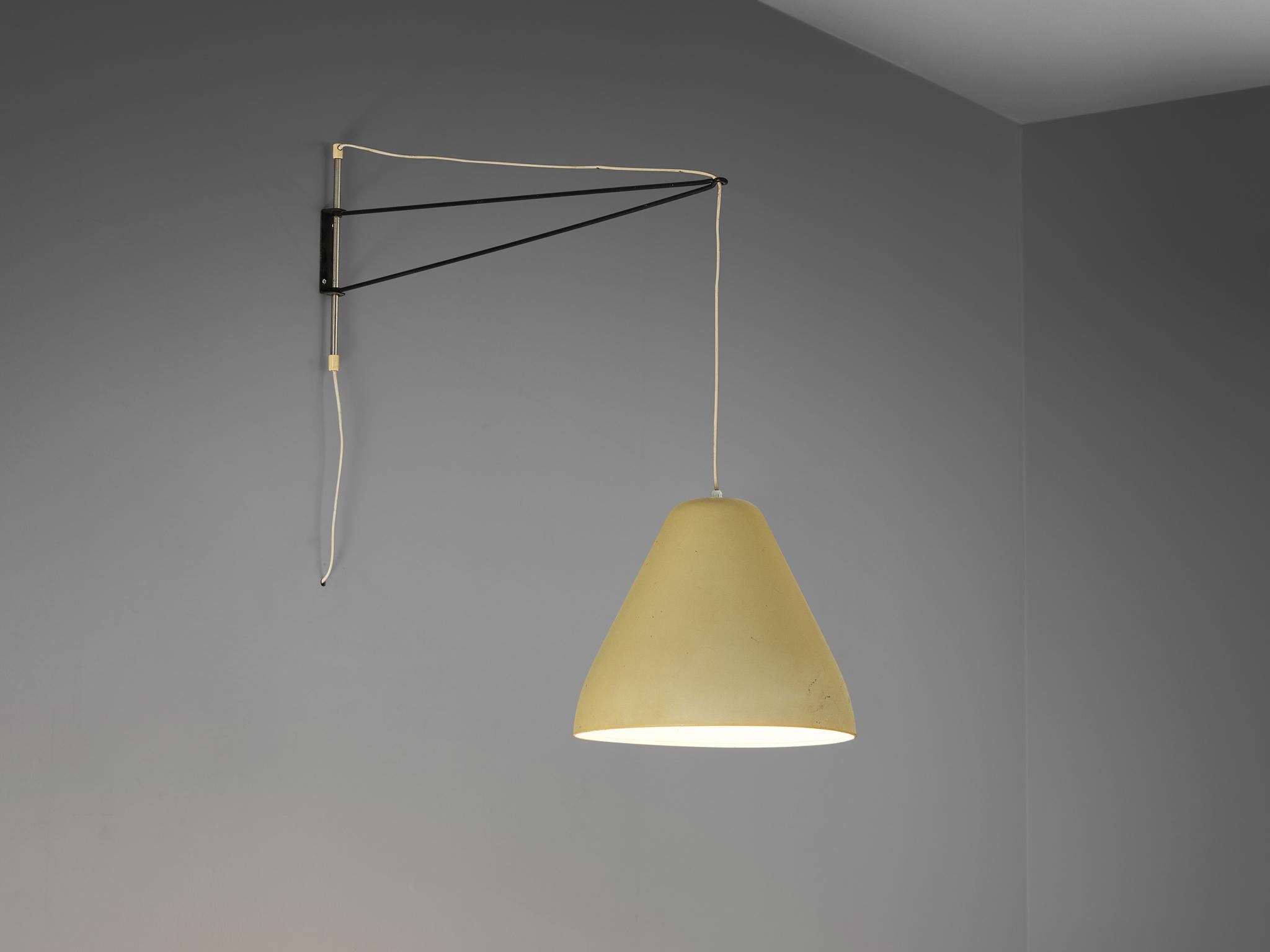 Wall lamp, metal, Italy, 1960s

Sophisticated wall light with swivel function made in Italy in the 1960s. This wall mounted light with very large yellow painted metal shade creates a nice contrast with the minimalistic thin black frame. Therefore,