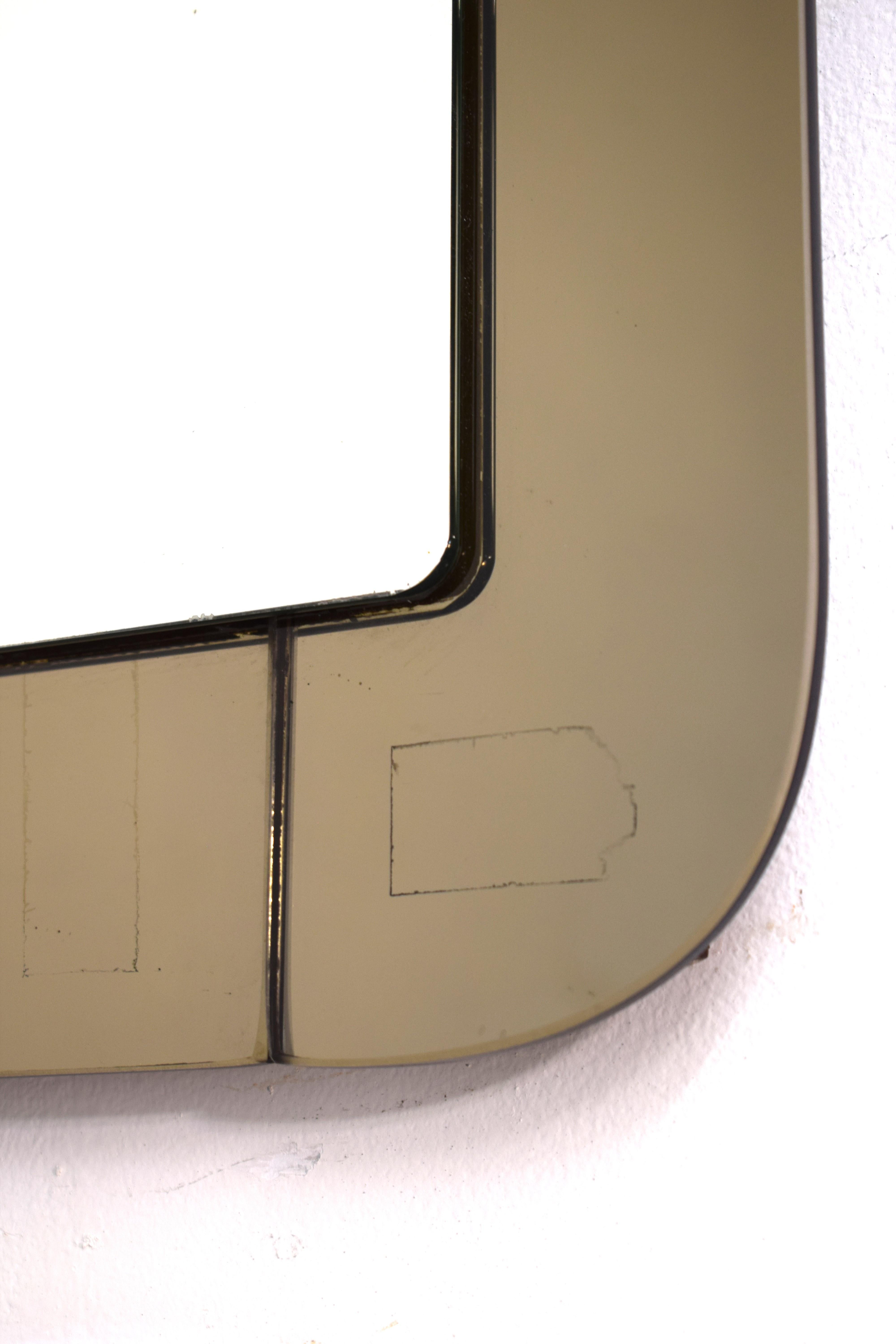 Italian wall mirror, 1960s.

Dimensions: H= 97 cm; W= 68 cm; D= 4 cm.