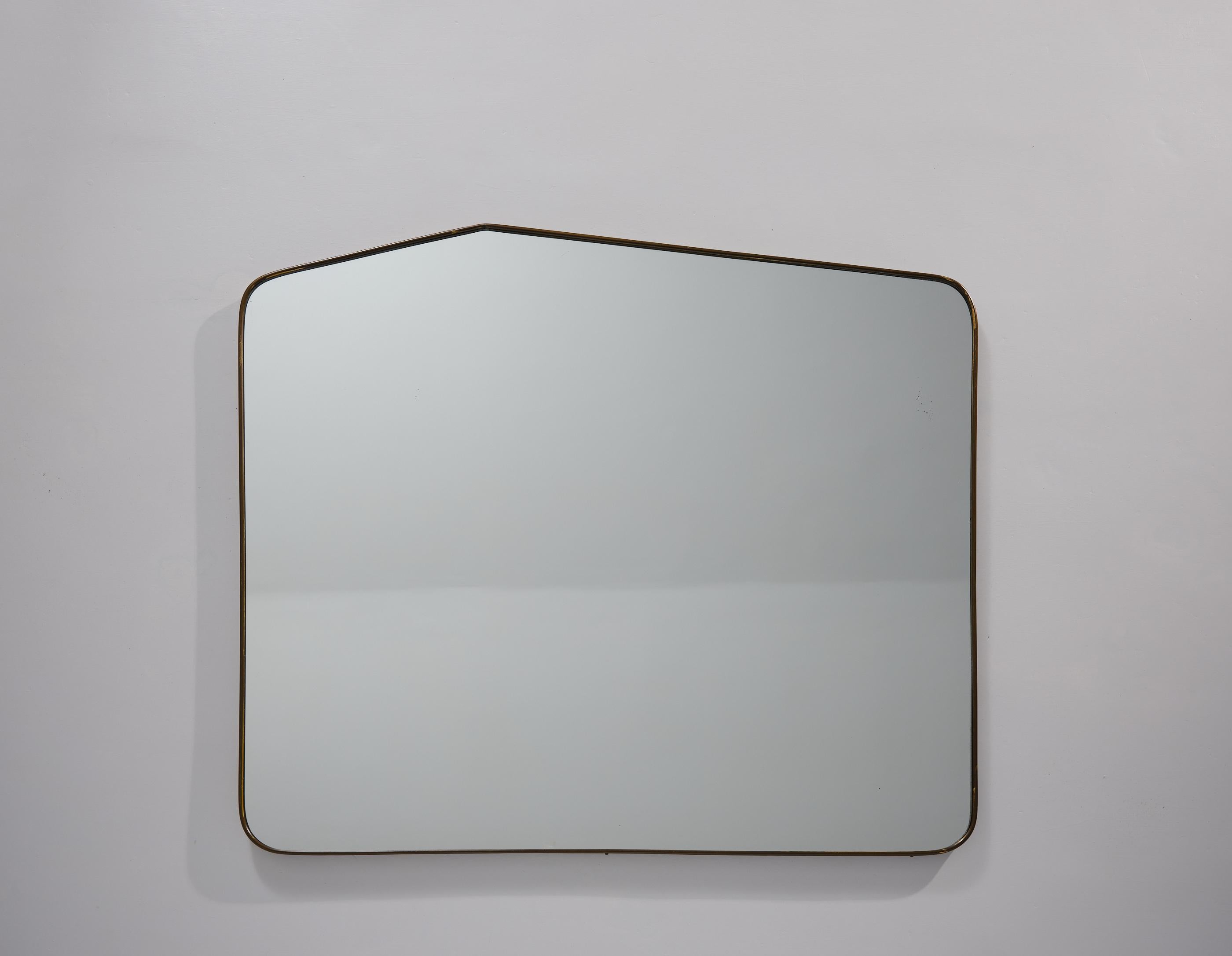 Italian wall mirror of modern design from the 50's

Made of mirrored glass and brass.