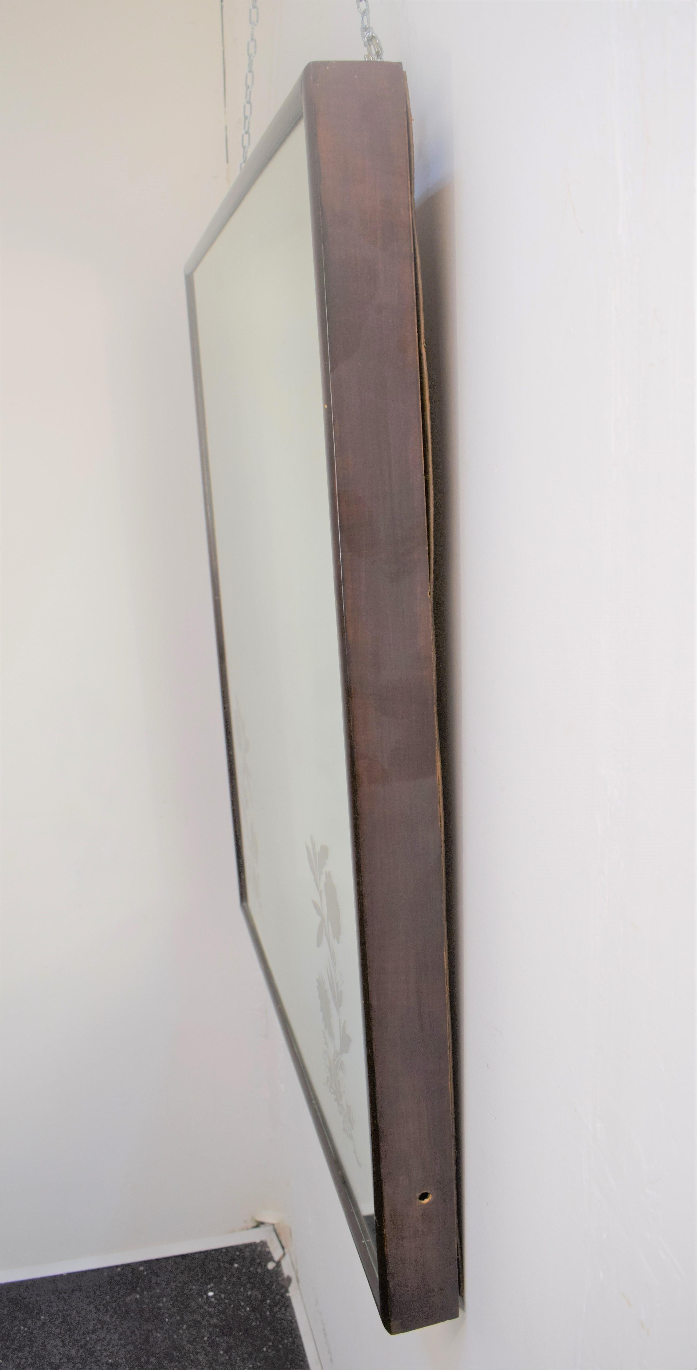Italian wall mirror with wooden frame, 1950s.
Dimensions: H= 100 cm; W= 88 cm; D= 7 cm.