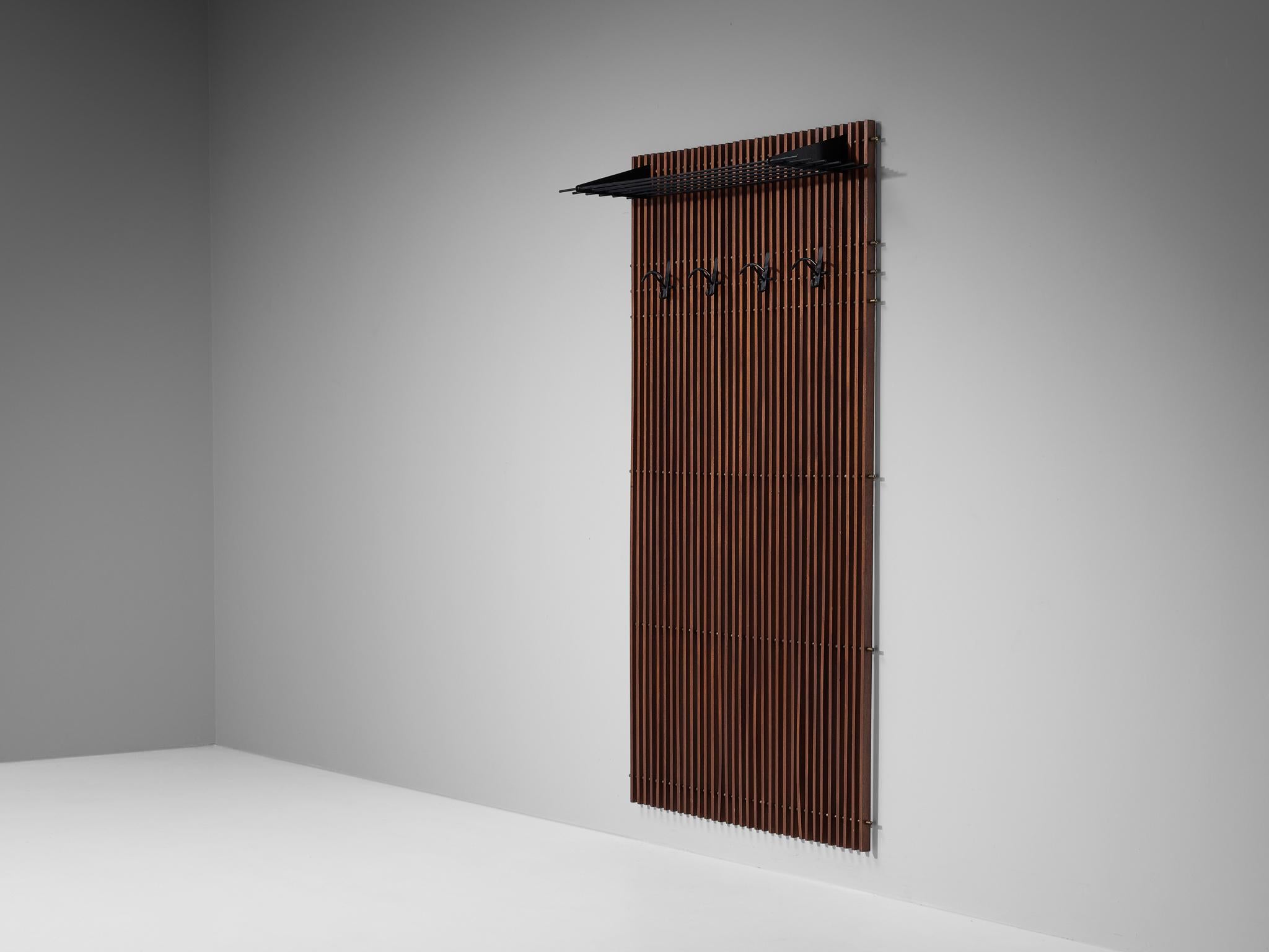 Hall stand or coat rack, teak, brass, coated steel, Italy, 1960s.

Sophisticated hall stand or coat rack made in Italy in the 1960s. This piece is build up from vertical slats of teakwood, creating a wall mounted hall stand or coat rack. The top