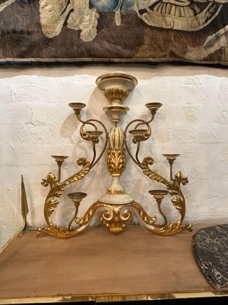 18th century Italian carved and parcel giltwood and iron wall sconce, circa 1780. A fine addition to any home!